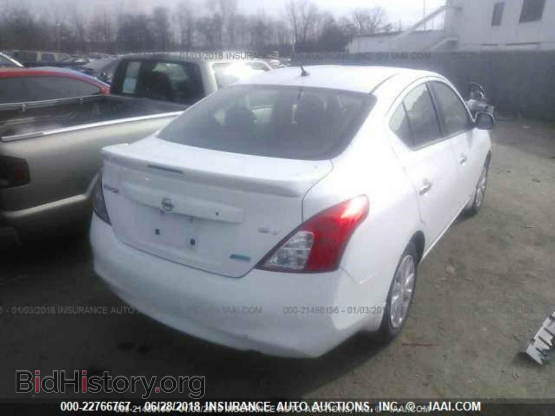 2014 Nissan Versa - VIN: 3N1CN7AP4EL853324 - Фото 4