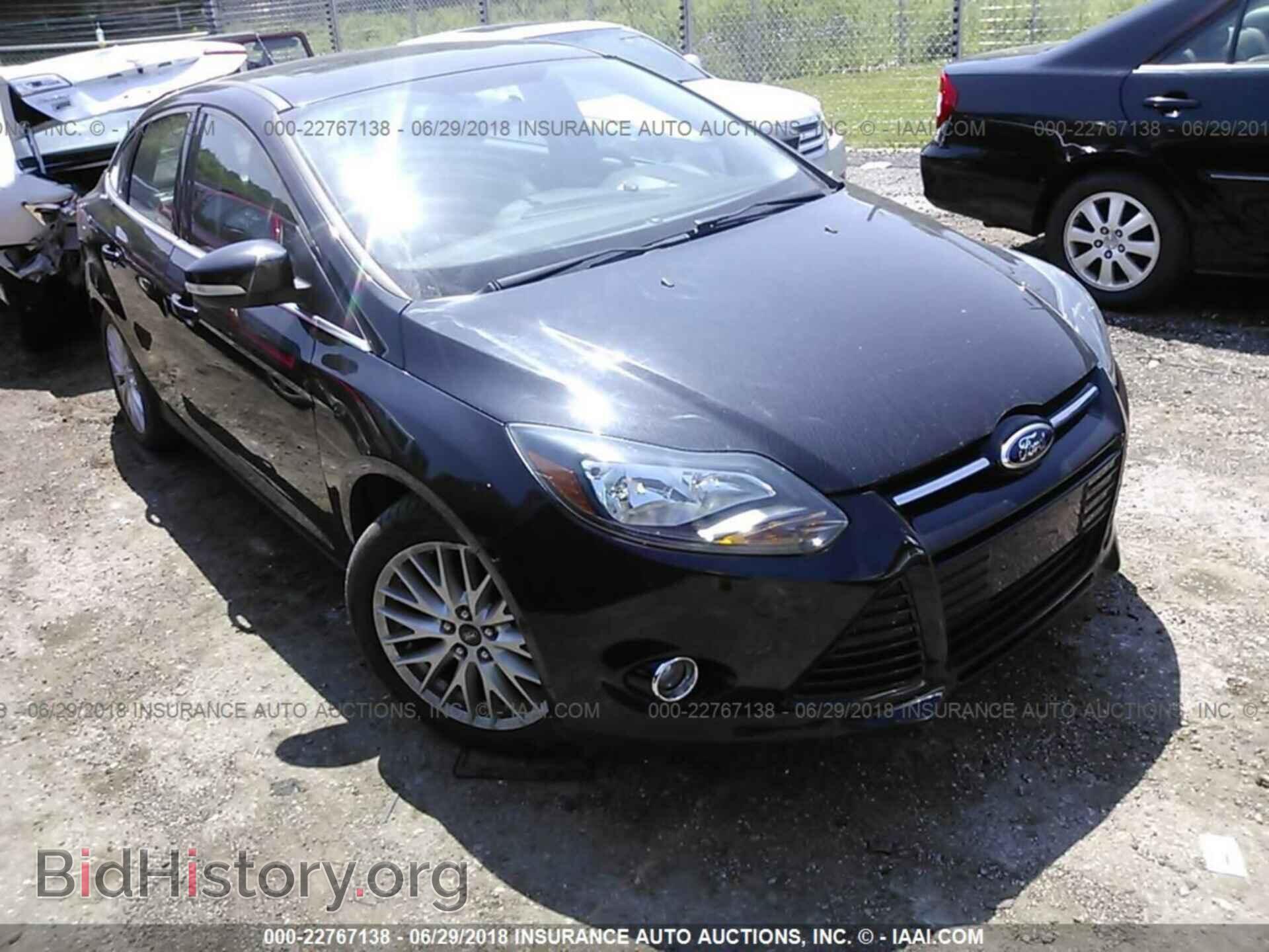 Фотография 1FADP3J28EL155552 - Ford Focus 2014