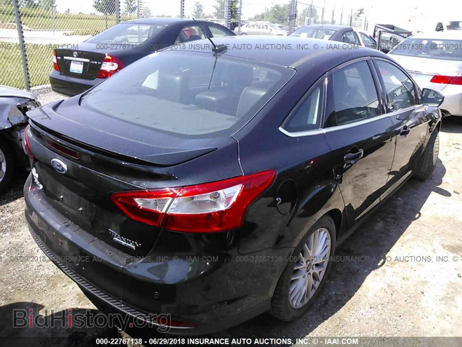 2014 Ford Focus - VIN: 1FADP3J28EL155552 - Photo 4