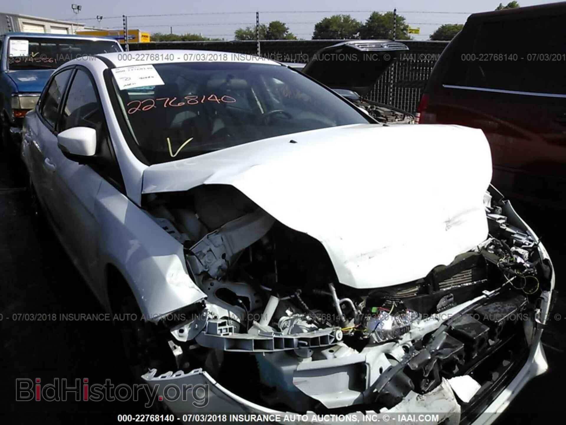 Фотография 1FADP3F20EL109688 - Ford Focus 2014