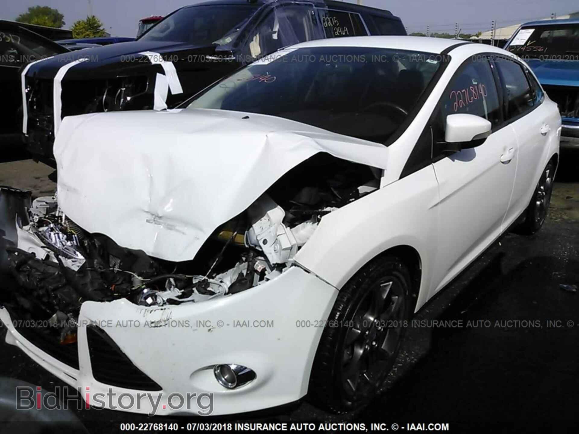2014 Ford Focus - VIN: 1FADP3F20EL109688 - Фото 2