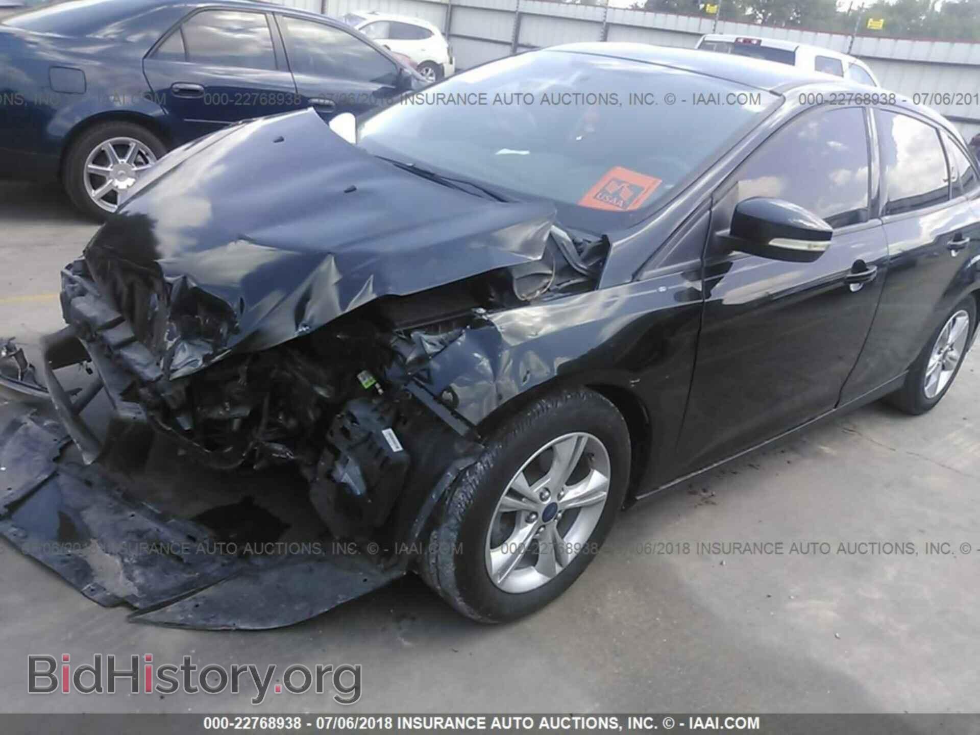 2014 Ford Focus - VIN: 1FADP3F28EL317494 - Фото 2