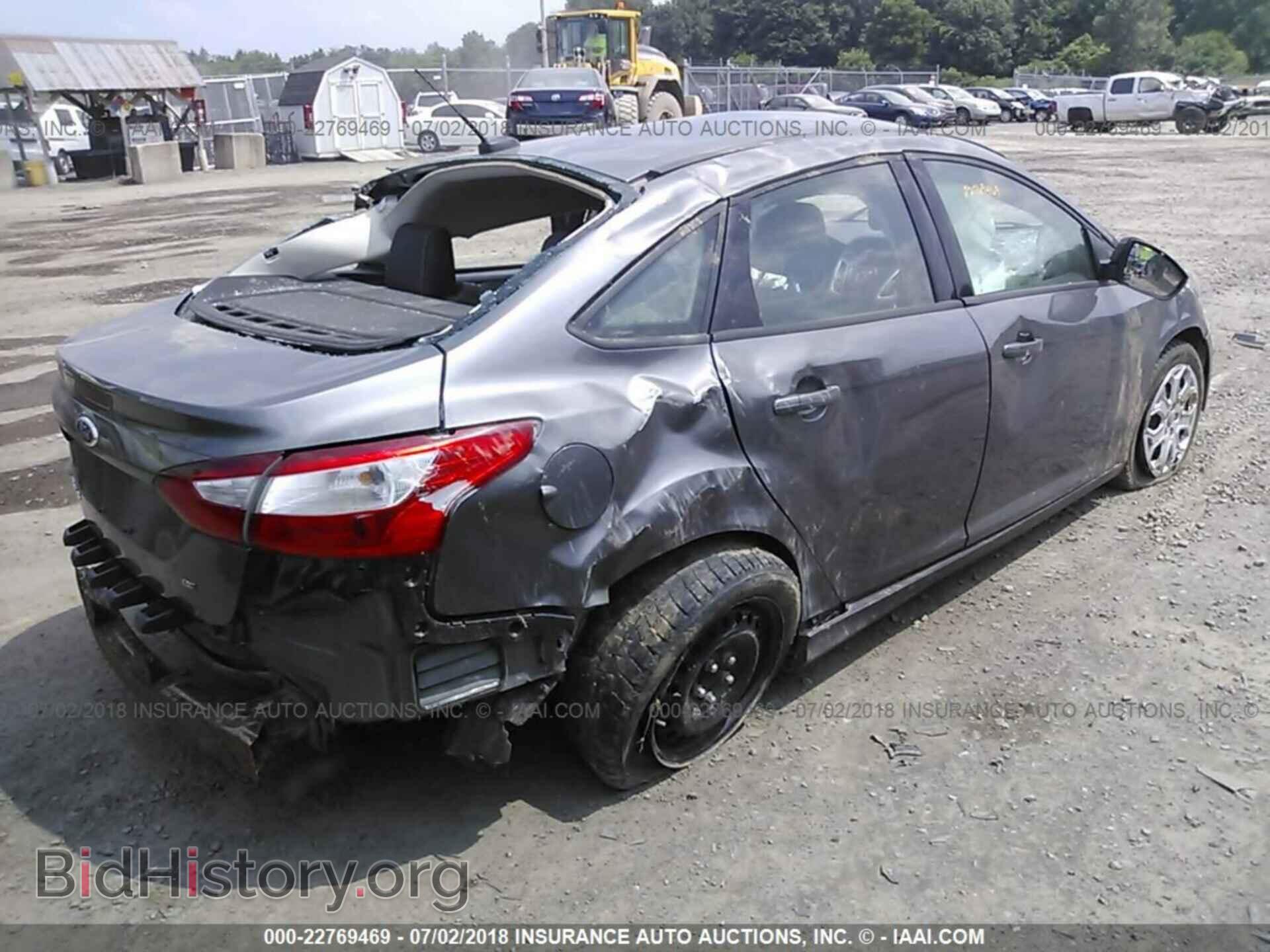 2012 Ford Focus - VIN: 1FAHP3F24CL261388 - Photo 4