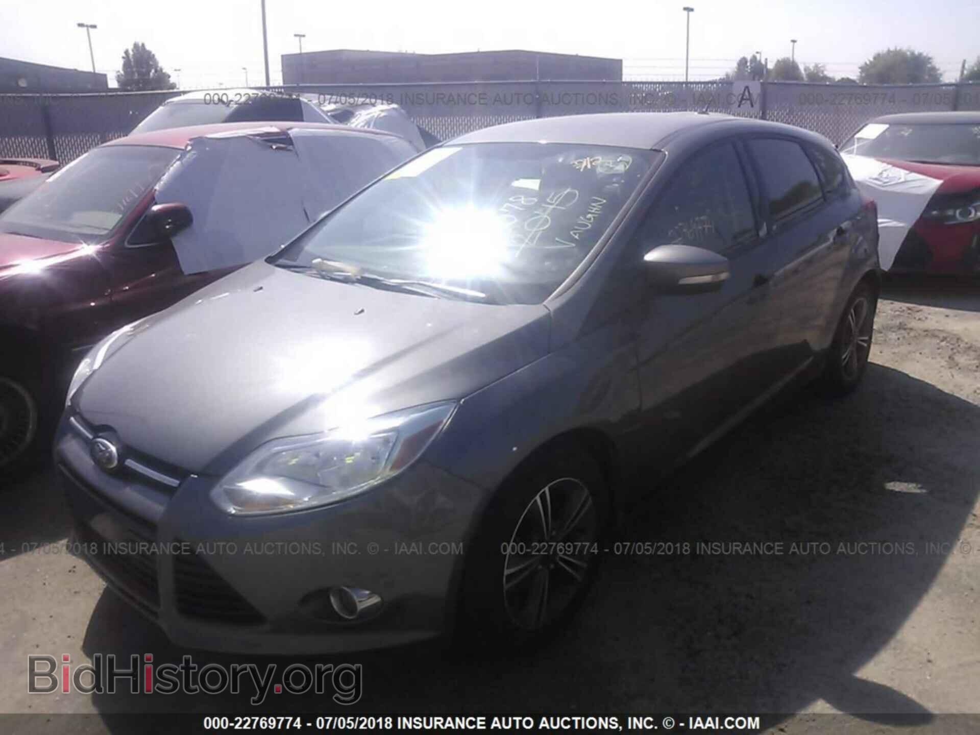 2012 Ford Focus - VIN: 1FAHP3K2XCL416337 - Photo 2