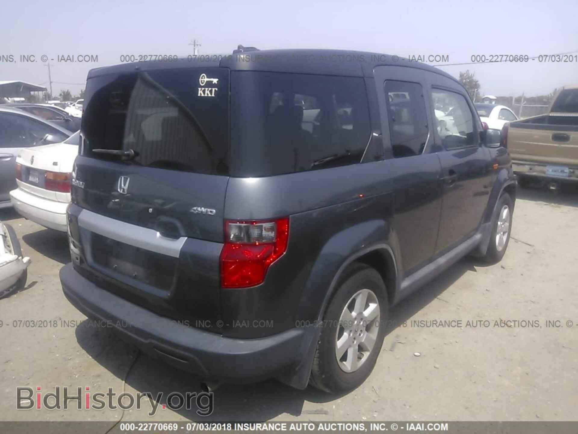 2011 Honda Element - VIN: 5J6YH2H74BL005030 - Photo 4