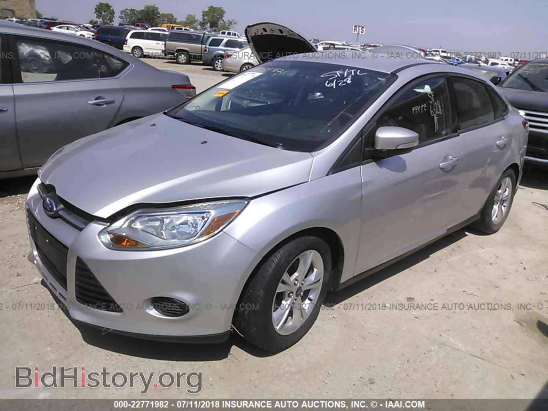 2014 Ford Focus - VIN: 1FADP3F21EL109747 - Photo 2