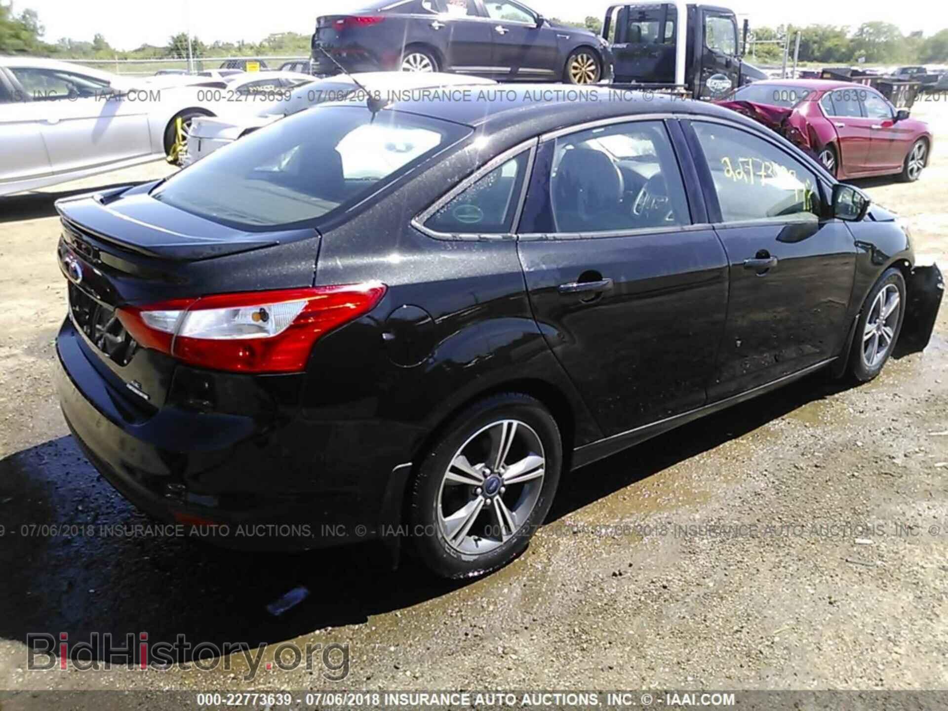2014 Ford Focus - VIN: 1FADP3F29EL449759 - Фото 4