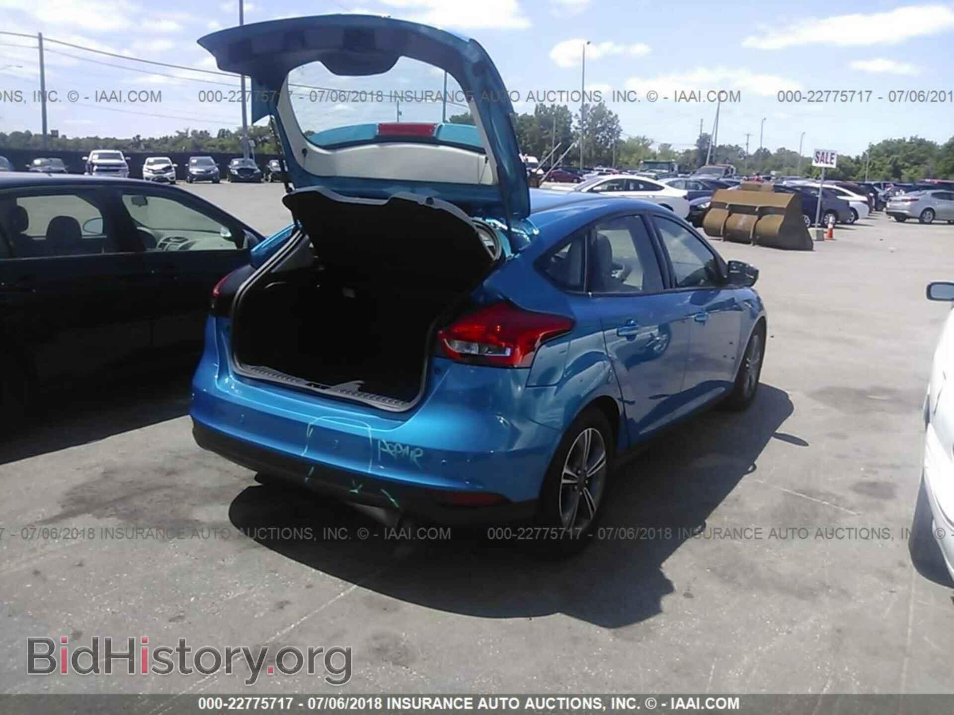 2016 Ford Focus - VIN: 1FADP3KEXGL202009 - Photo 4