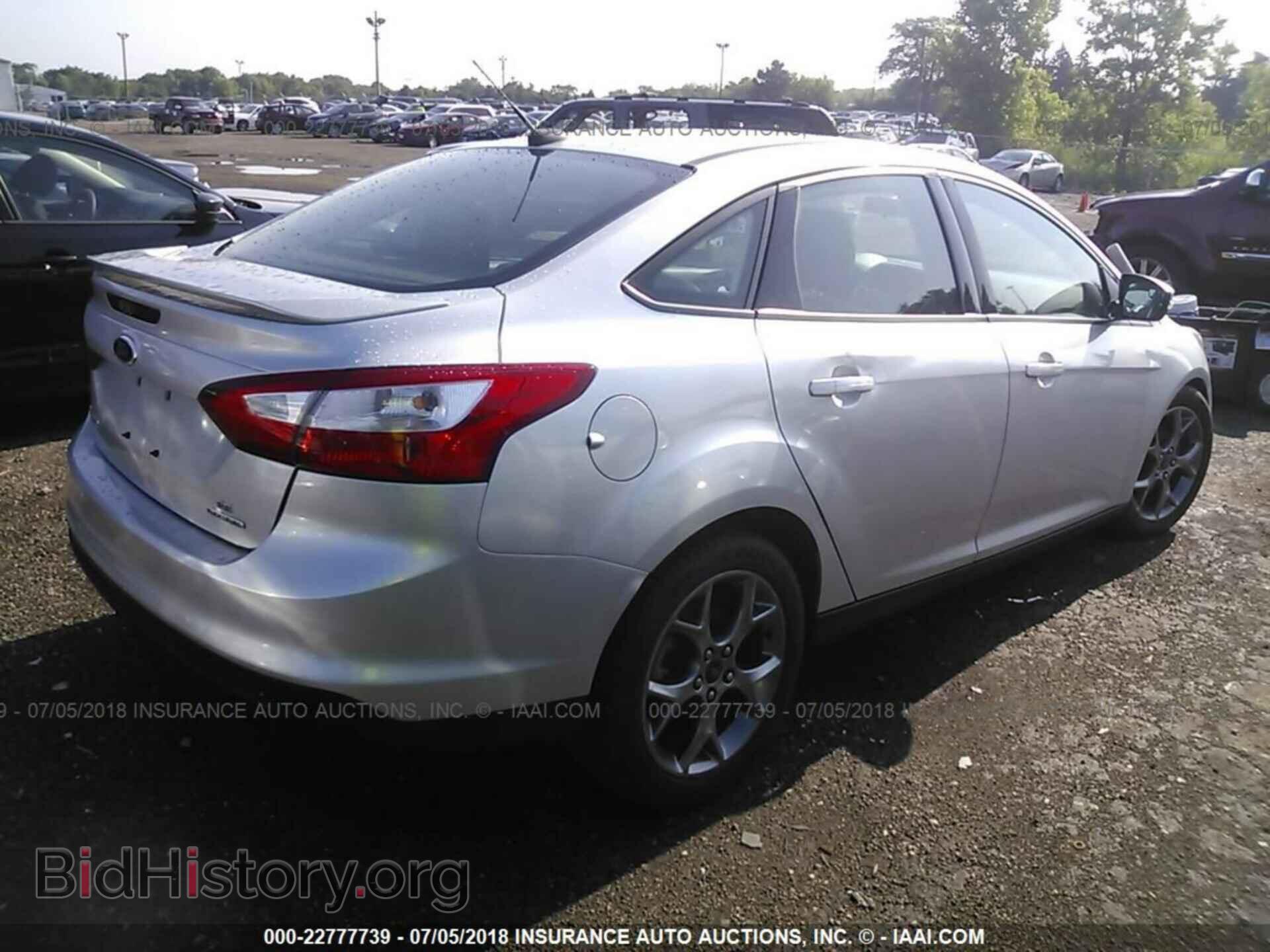 2014 Ford Focus - VIN: 1FADP3F26EL235618 - Photo 4