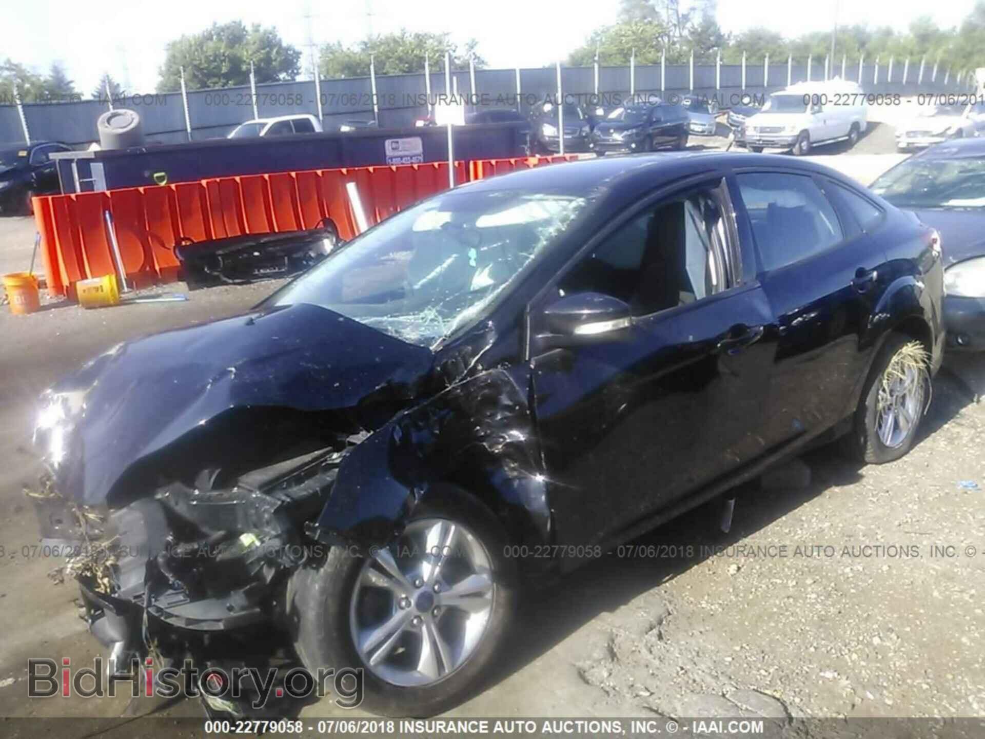 2014 Ford Focus - VIN: 1FADP3F29EL272985 - Фото 2
