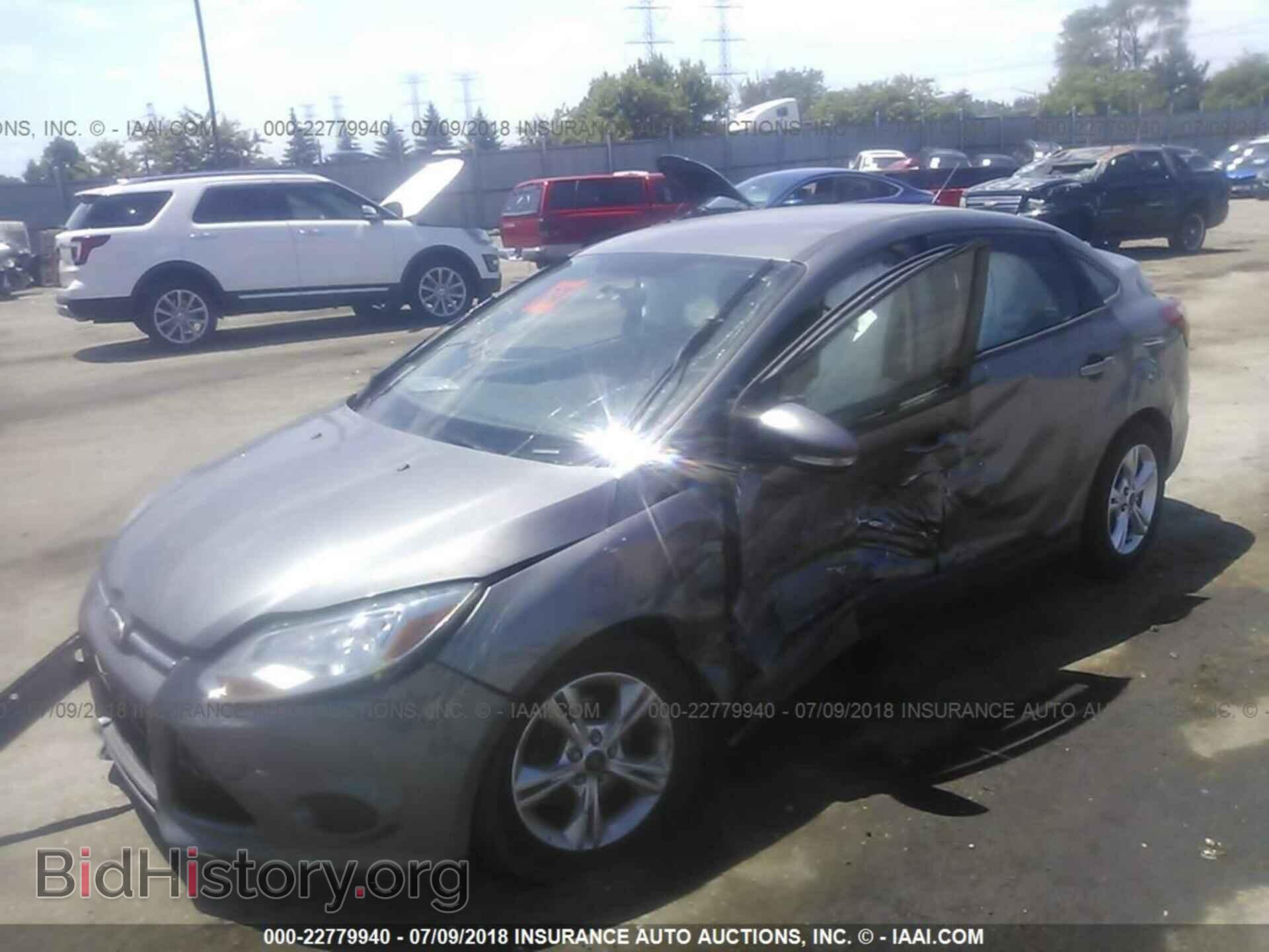 2014 Ford Focus - VIN: 1FADP3F24EL322532 - Photo 2