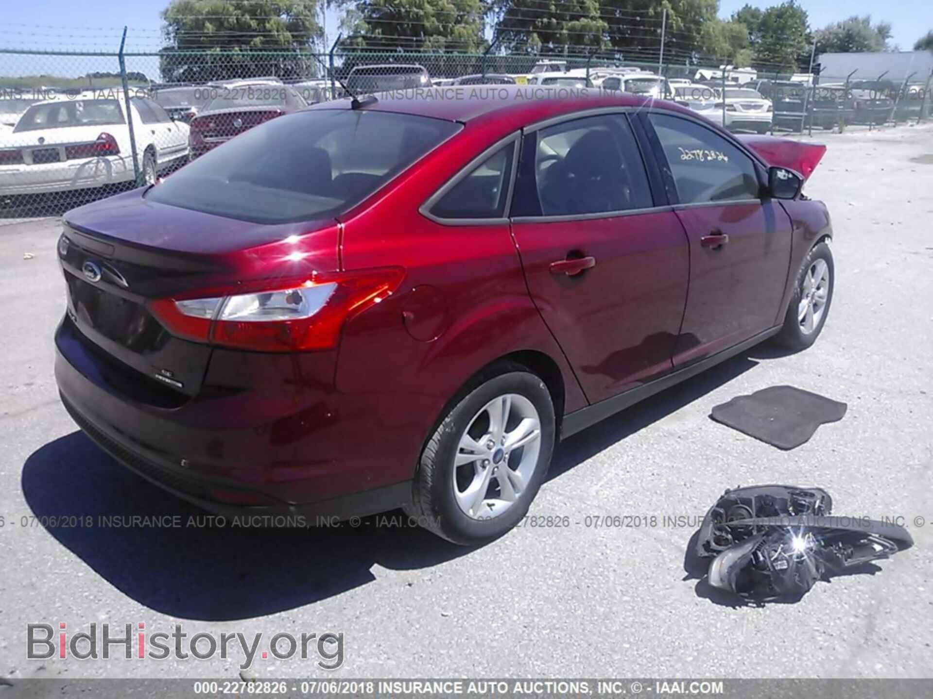 2014 Ford Focus - VIN: 1FADP3F24EL389776 - Фото 4