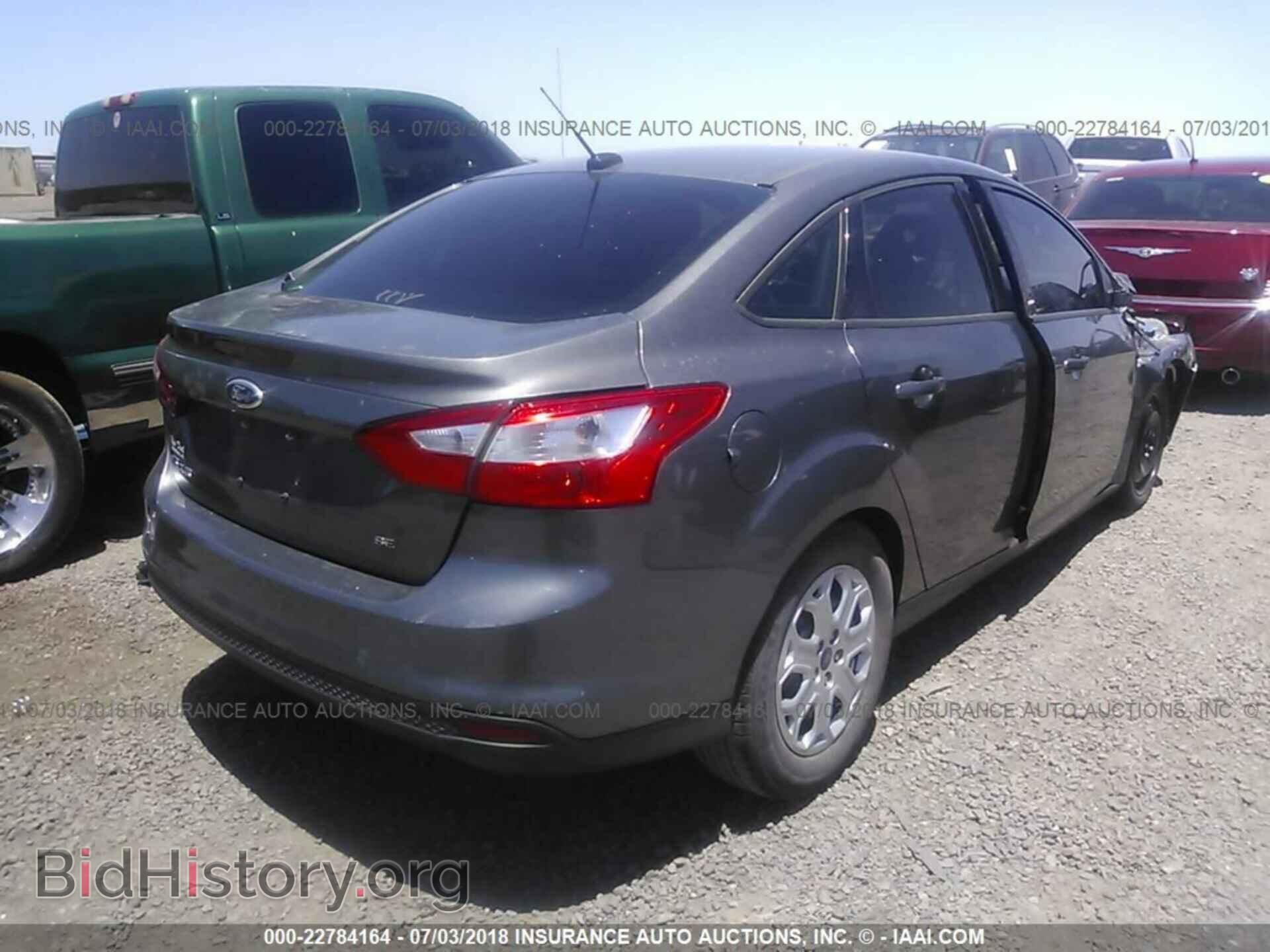 2012 Ford Focus - VIN: 1FAHP3F29CL302839 - Photo 4
