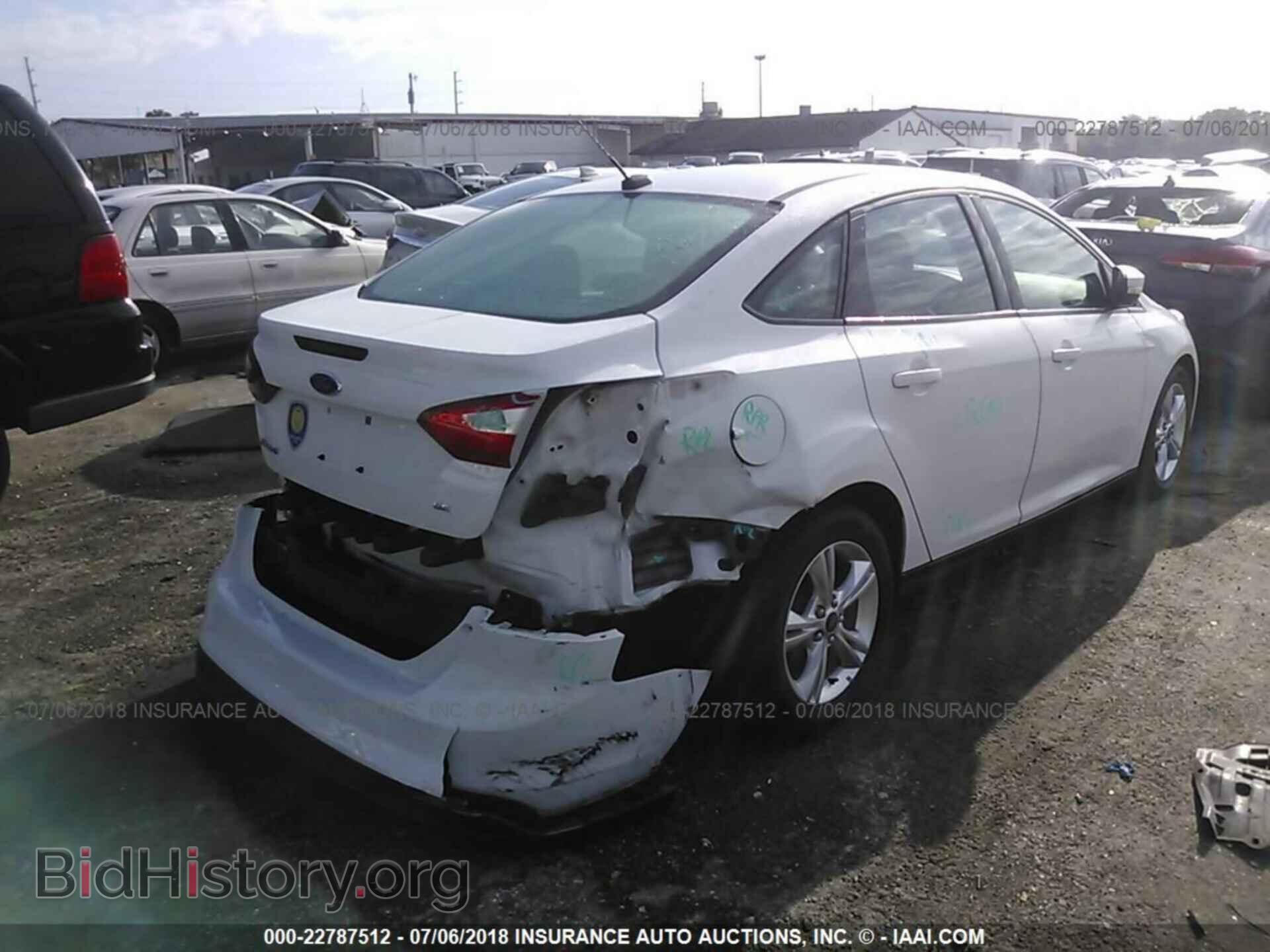 2013 Ford Focus - VIN: 1FADP3F24DL314879 - Фото 4