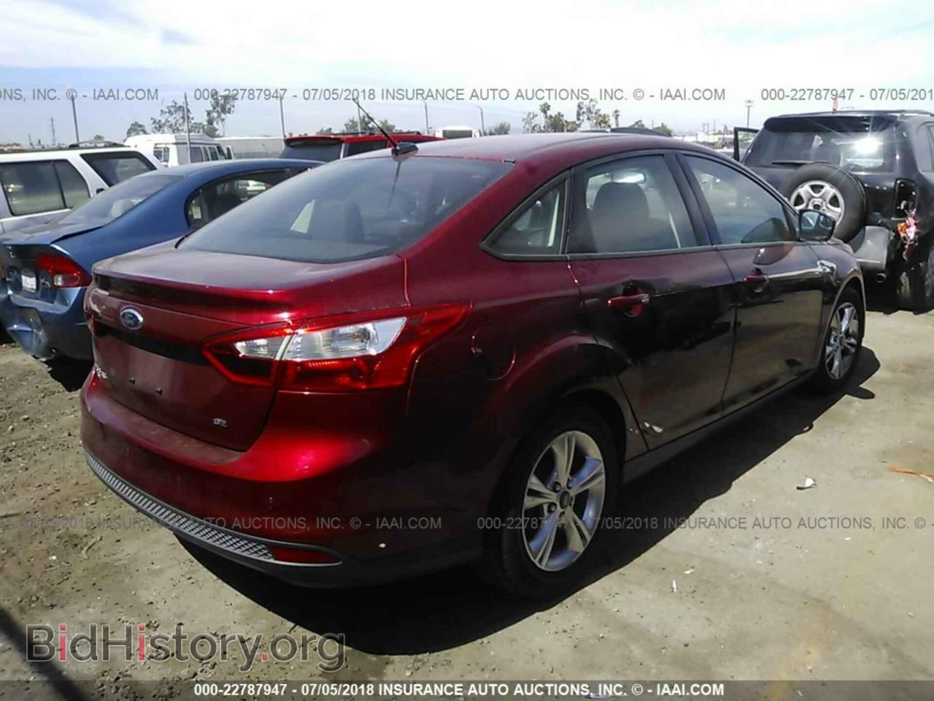 2014 Ford Focus - VIN: 1FADP3F29EL210180 - Фото 4