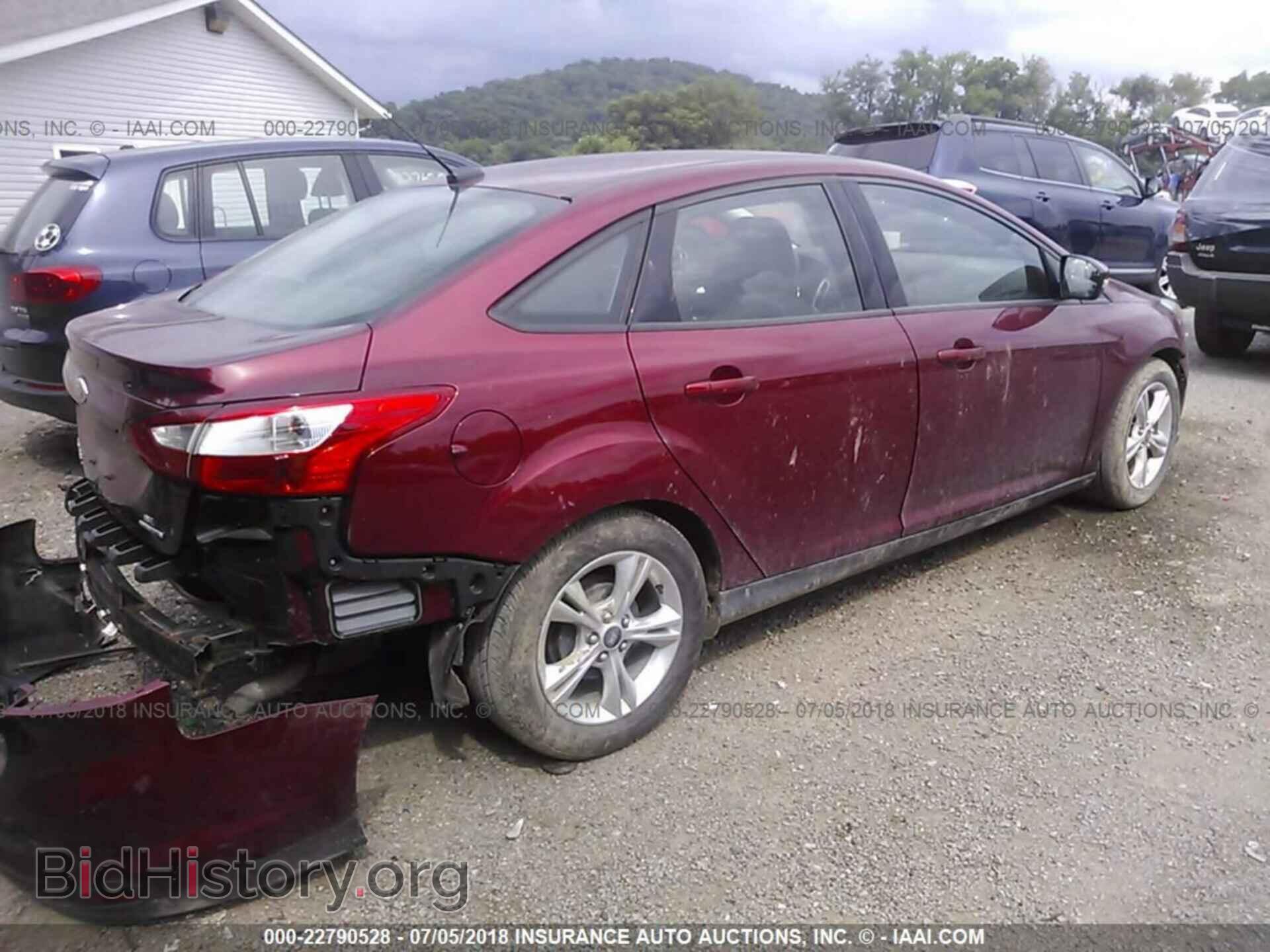2014 Ford Focus - VIN: 1FADP3F27EL181925 - Photo 4
