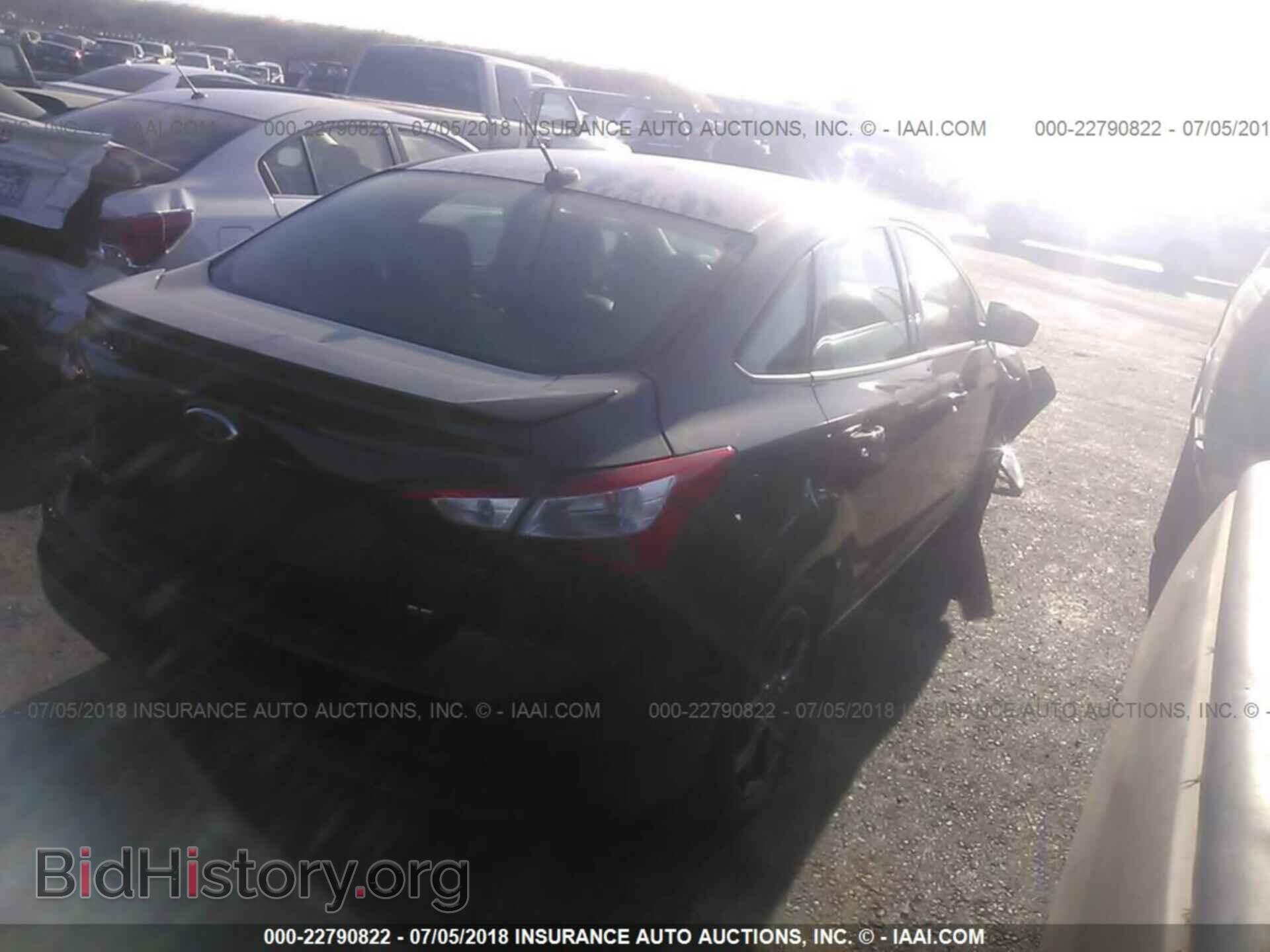 2013 Ford Focus - VIN: 1FADP3F25DL205301 - Photo 4