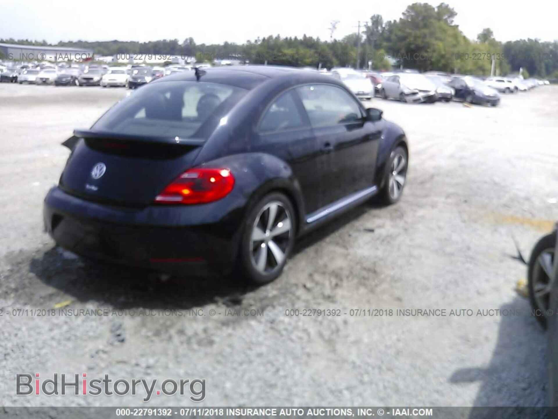 2012 Volkswagen Beetle - VIN: 3VWVA7ATXCM616677 - Фото 4