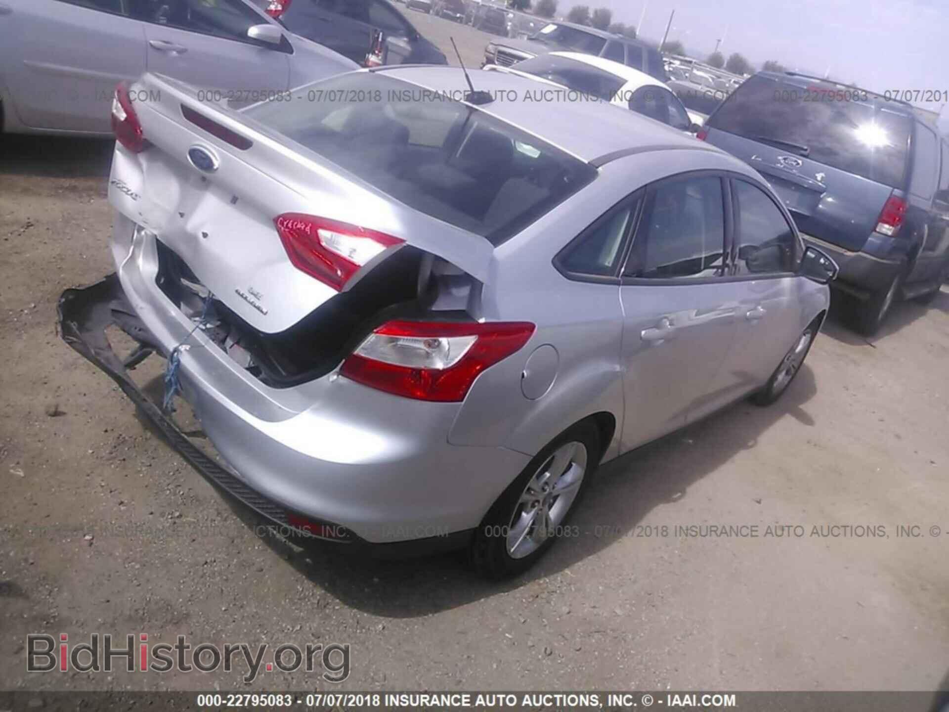 2014 Ford Focus - VIN: 1FADP3F23EL200308 - Photo 4