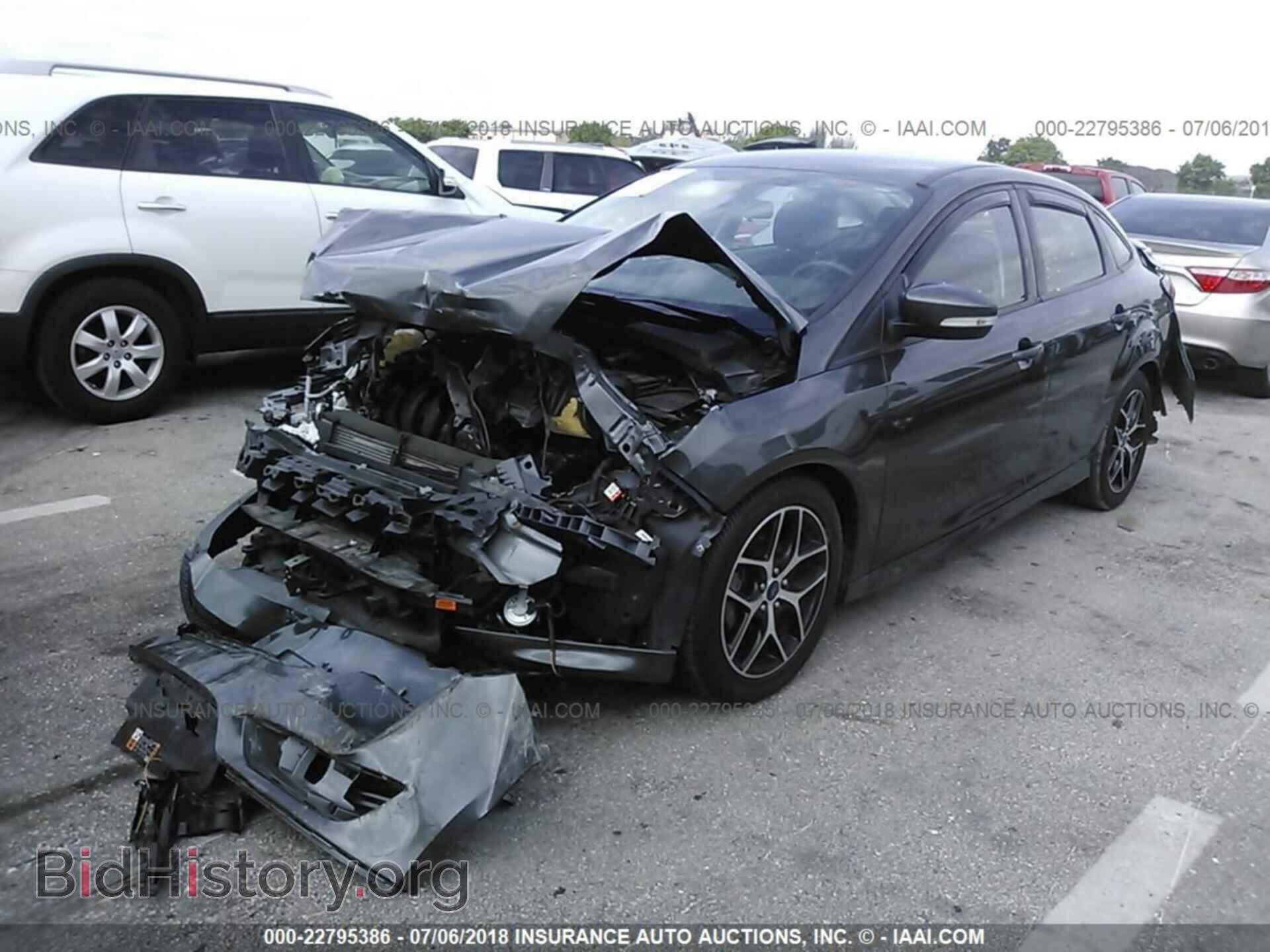 2016 Ford Focus - VIN: 1FADP3F20GL374128 - Фото 2