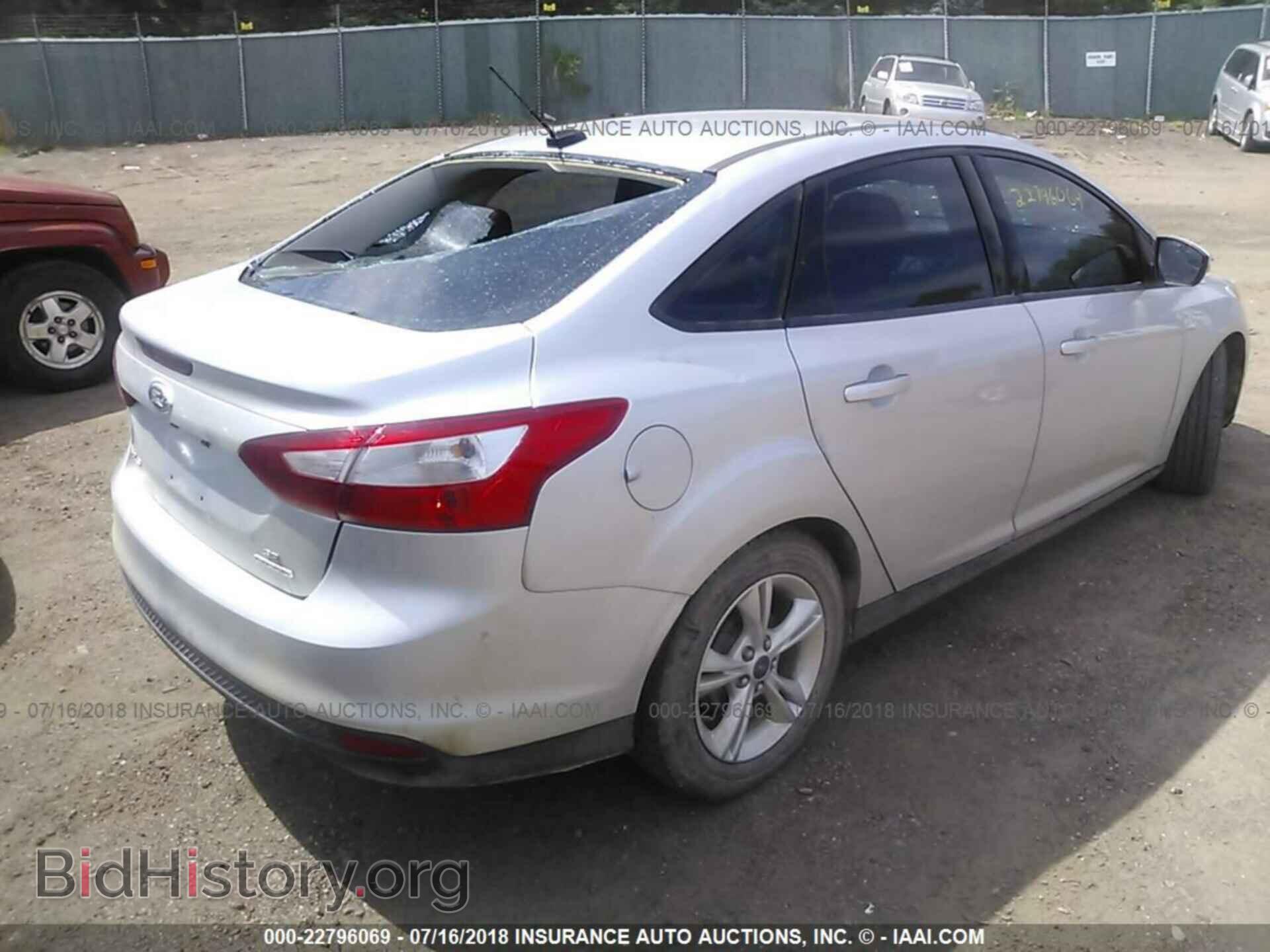 2014 Ford Focus - VIN: 1FADP3F29EL149509 - Photo 4