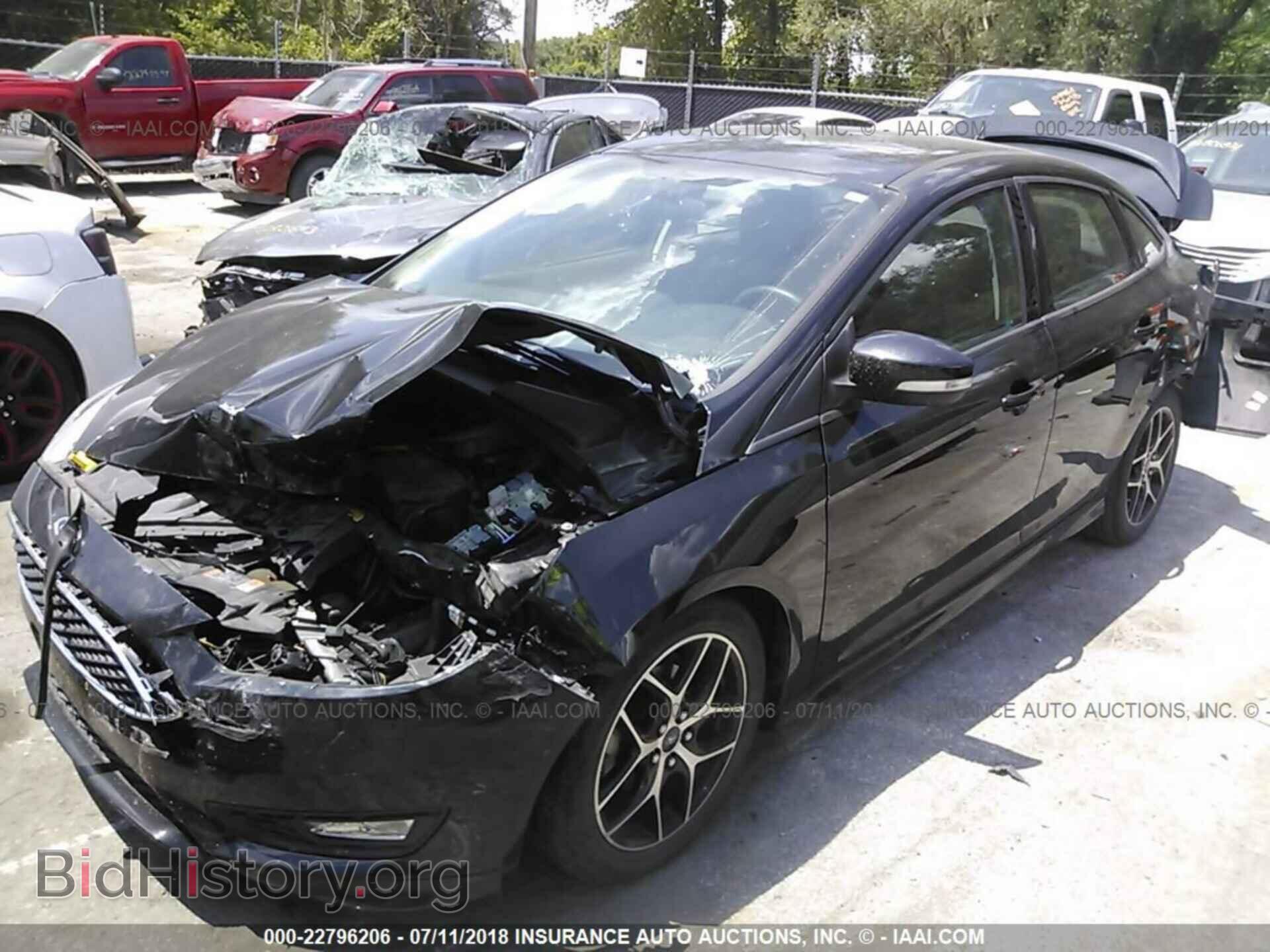 2015 Ford Focus - VIN: 1FADP3F21FL323901 - Photo 2