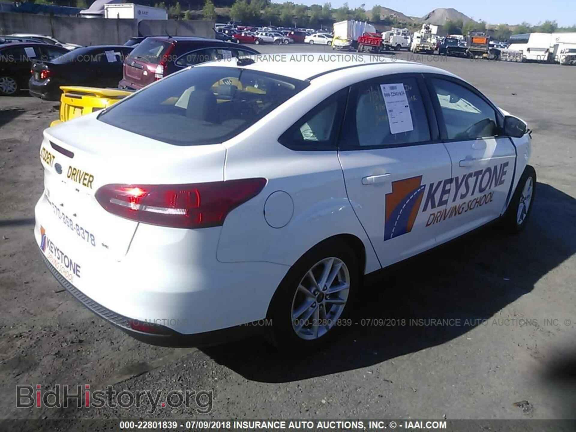 2015 Ford Focus - VIN: 1FADP3F21FL250285 - Photo 4