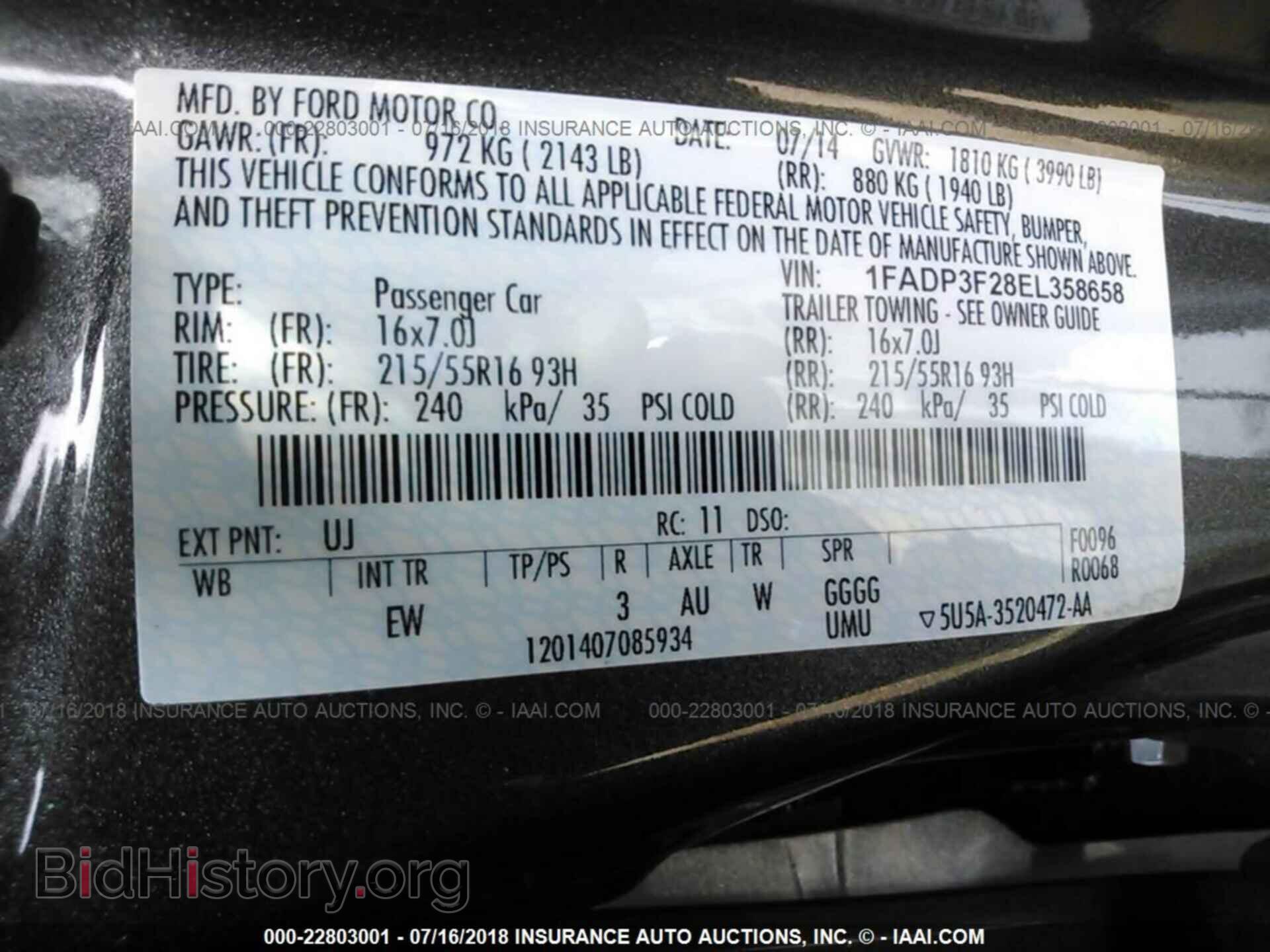 2014 Ford Focus - VIN: 1FADP3F28EL358658 - Photo 9