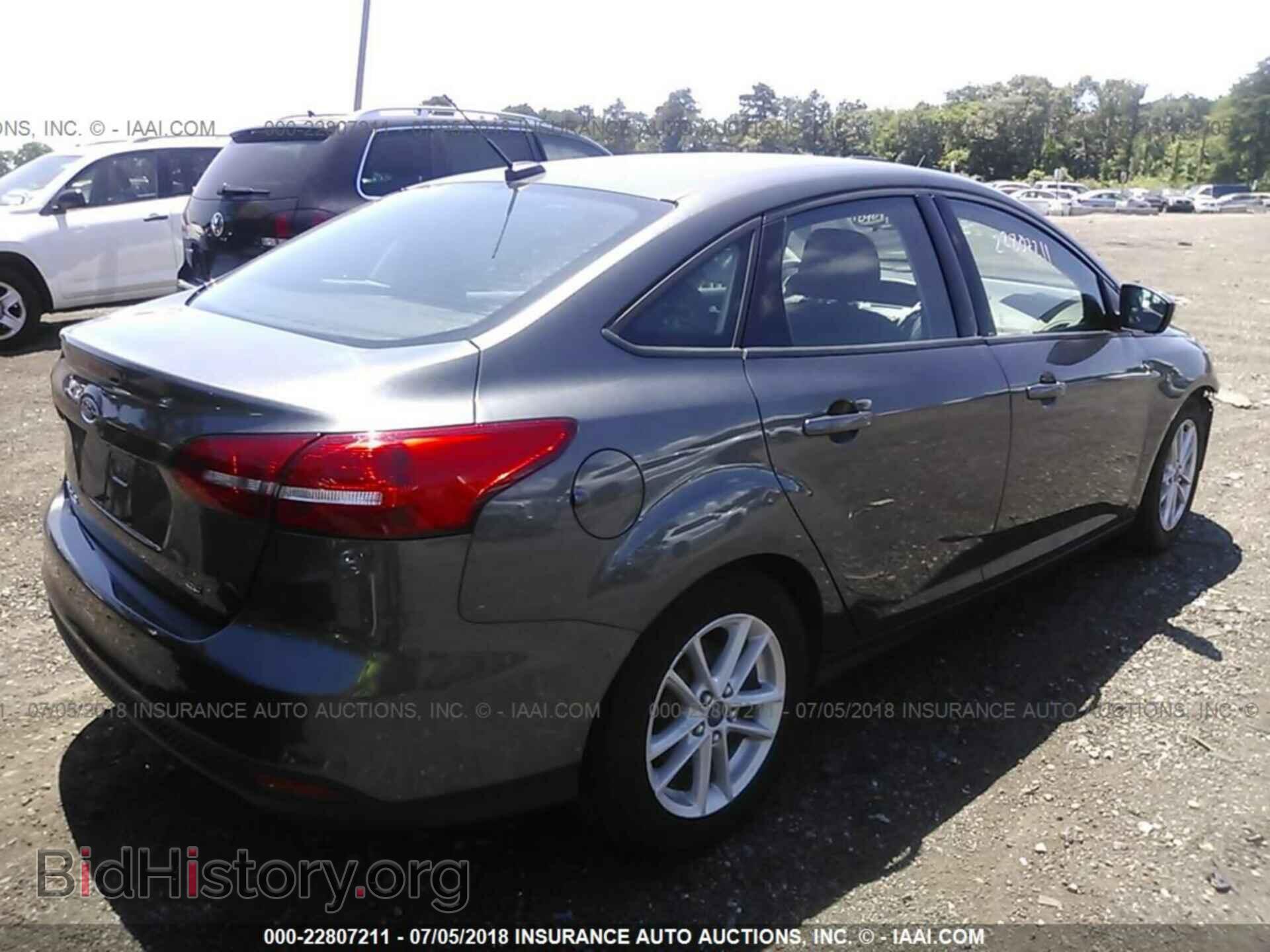 2015 Ford Focus - VIN: 1FADP3F26FL209358 - Фото 4