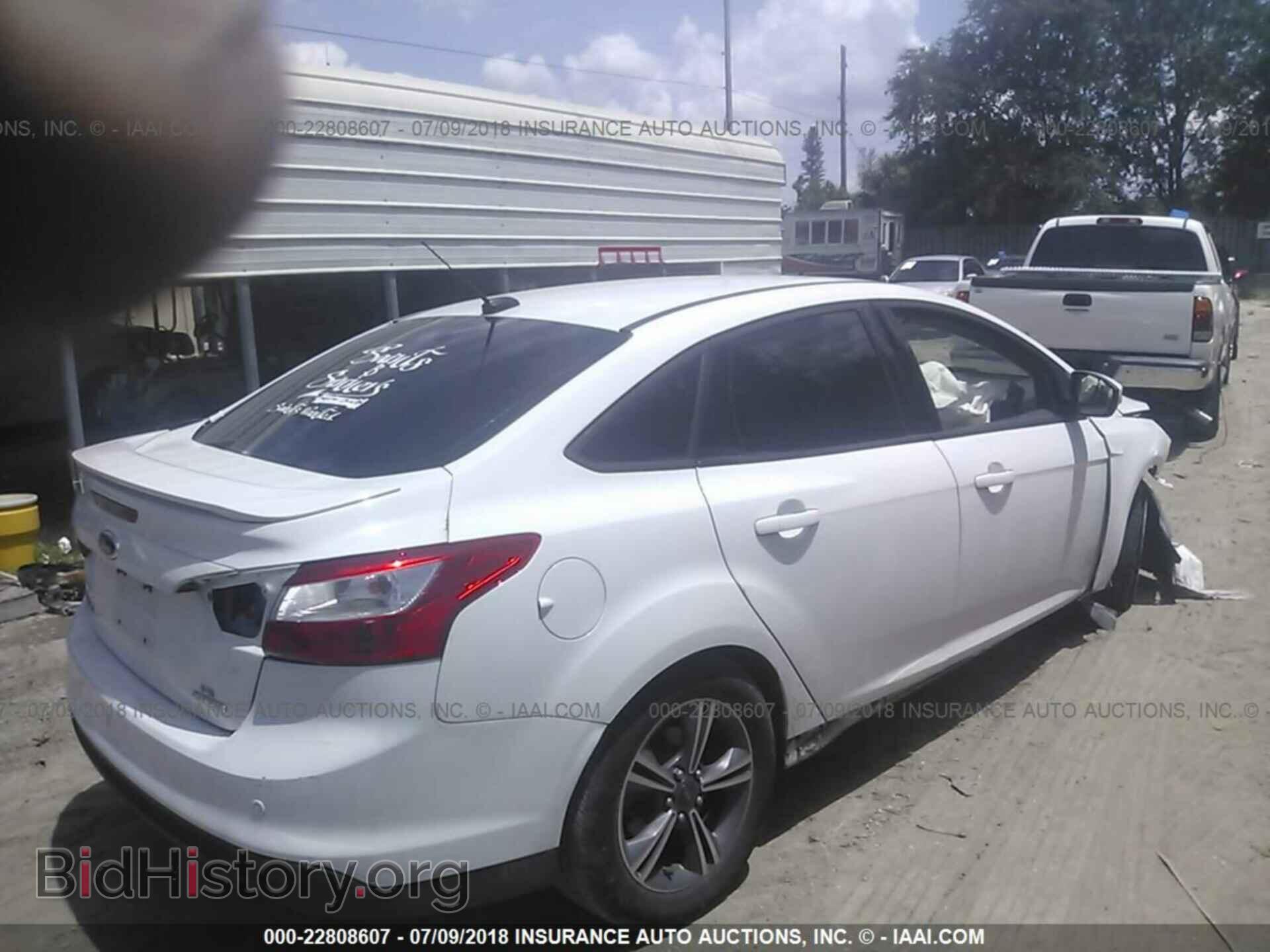 2014 Ford Focus - VIN: 1FADP3F23EL329651 - Фото 4