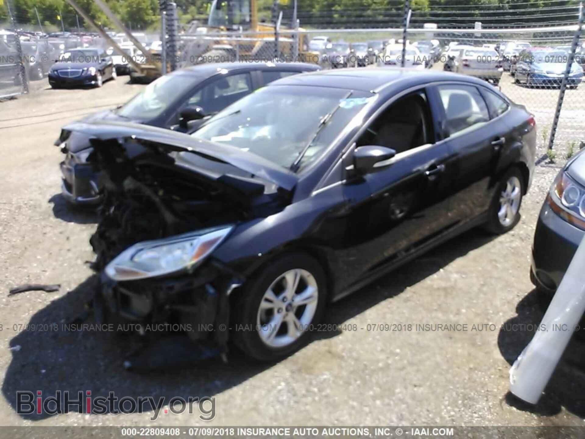 2014 Ford Focus - VIN: 1FADP3F20EL162973 - Фото 2