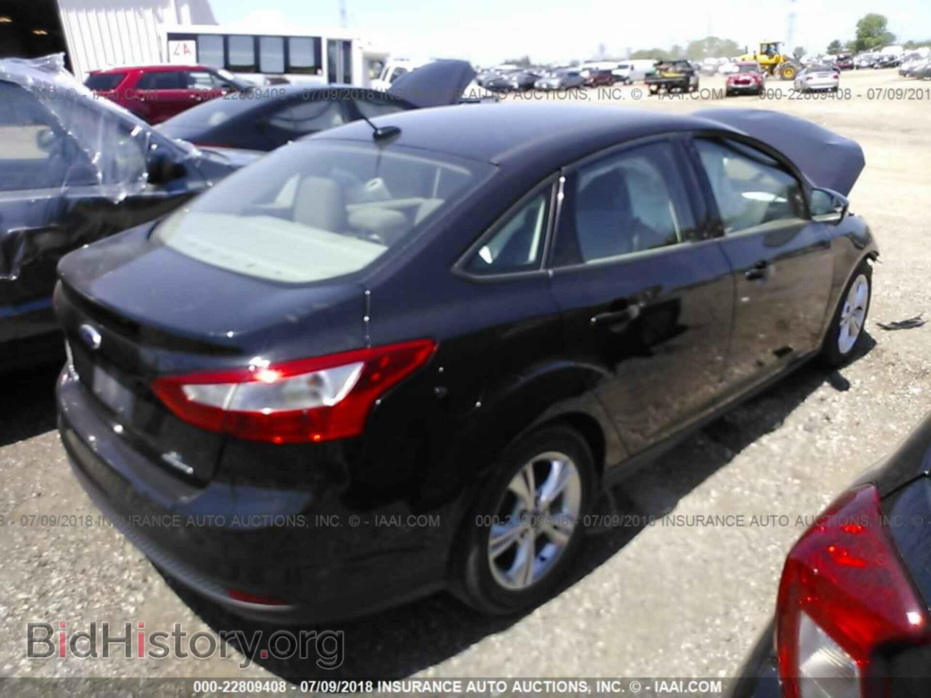 2014 Ford Focus - VIN: 1FADP3F20EL162973 - Фото 4