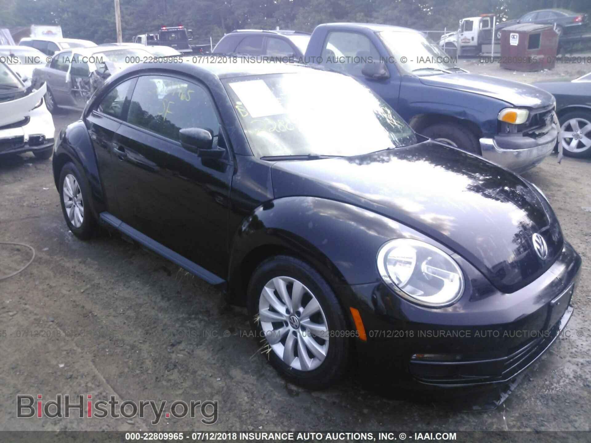 Photo 3VWFP7AT7EM621079 - Volkswagen Beetle 2014