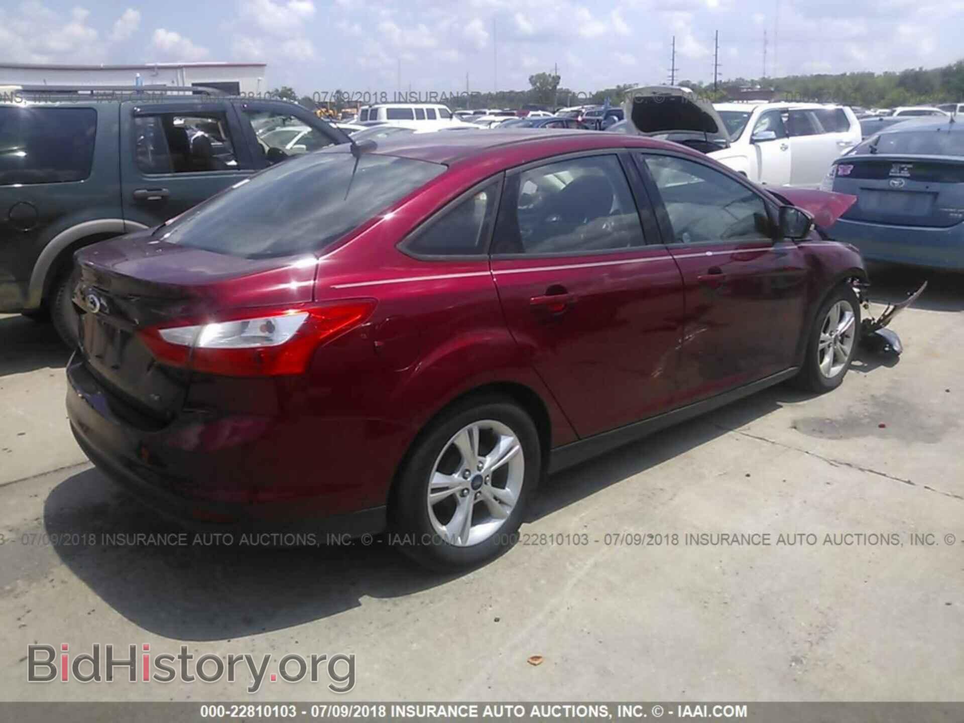 2014 Ford Focus - VIN: 1FADP3F2XEL318887 - Photo 4