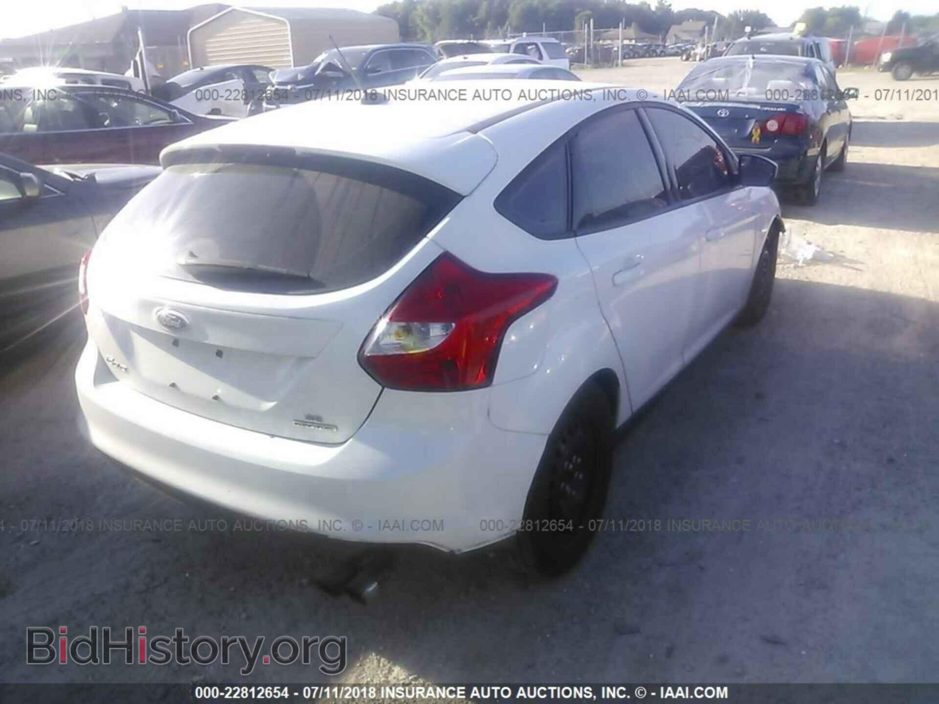 2012 Ford Focus - VIN: 1FAHP3K2XCL434093 - Photo 4