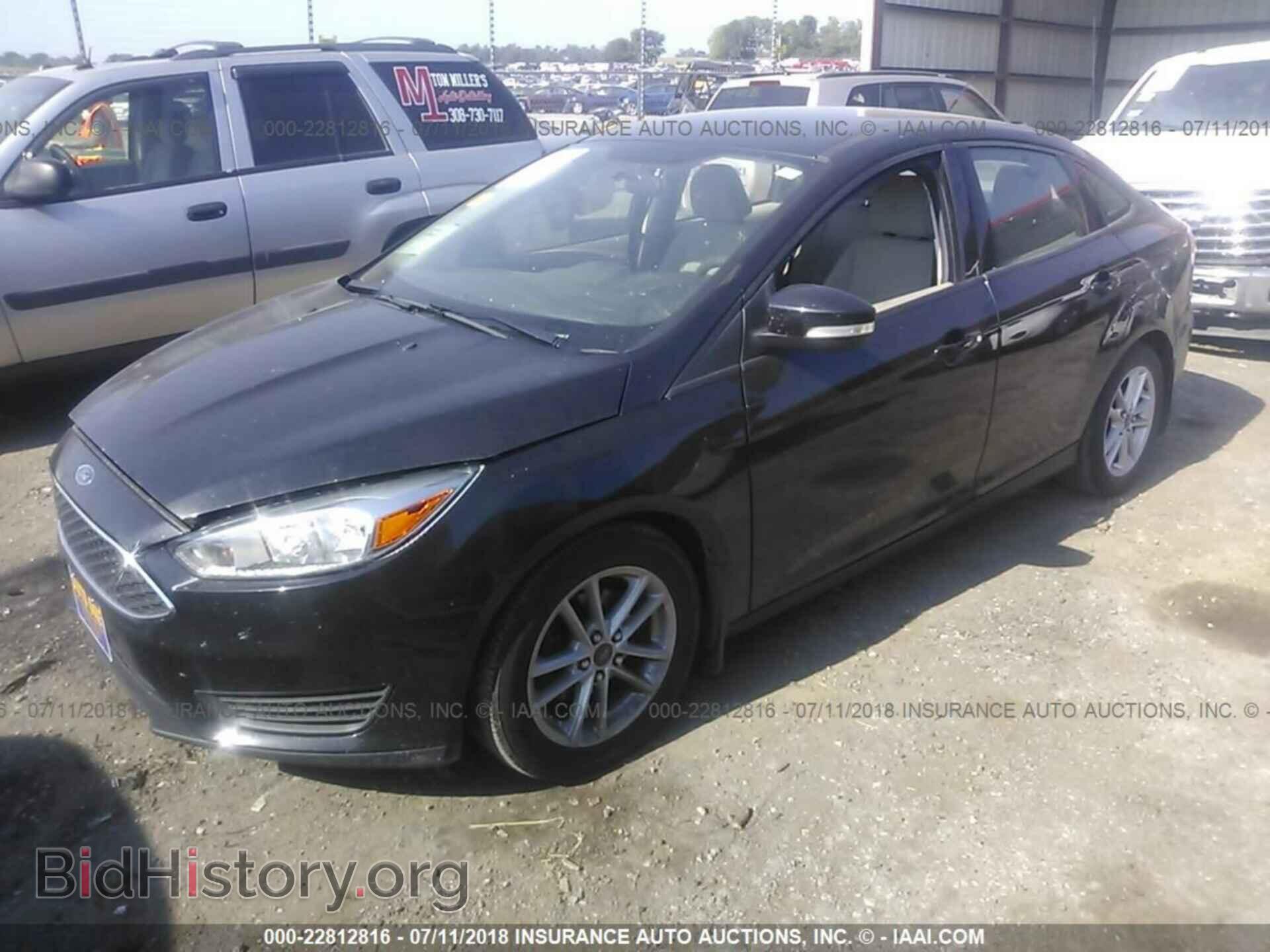 2015 Ford Focus - VIN: 1FADP3F21FL289846 - Photo 2