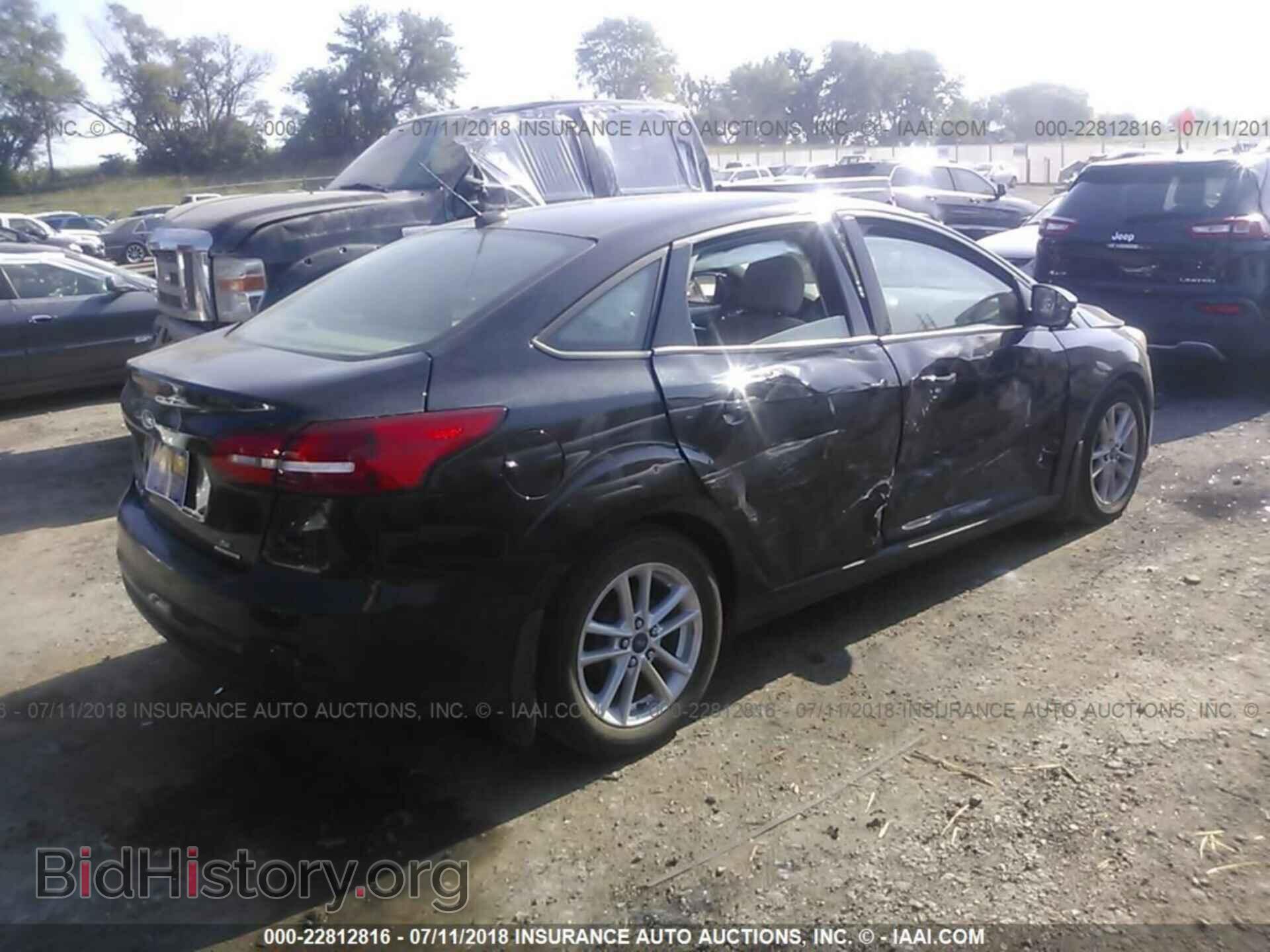 2015 Ford Focus - VIN: 1FADP3F21FL289846 - Photo 4