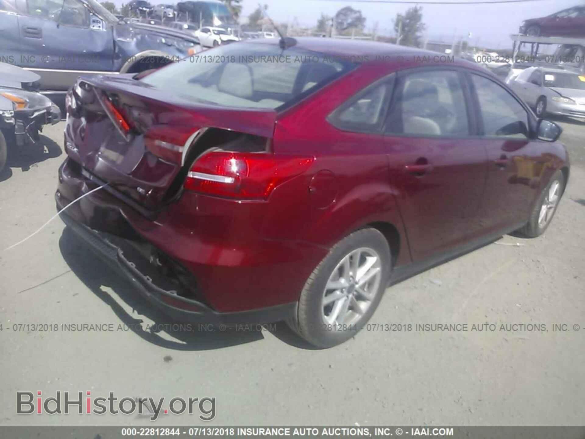 2015 Ford Focus - VIN: 1FADP3F21FL256720 - Photo 4