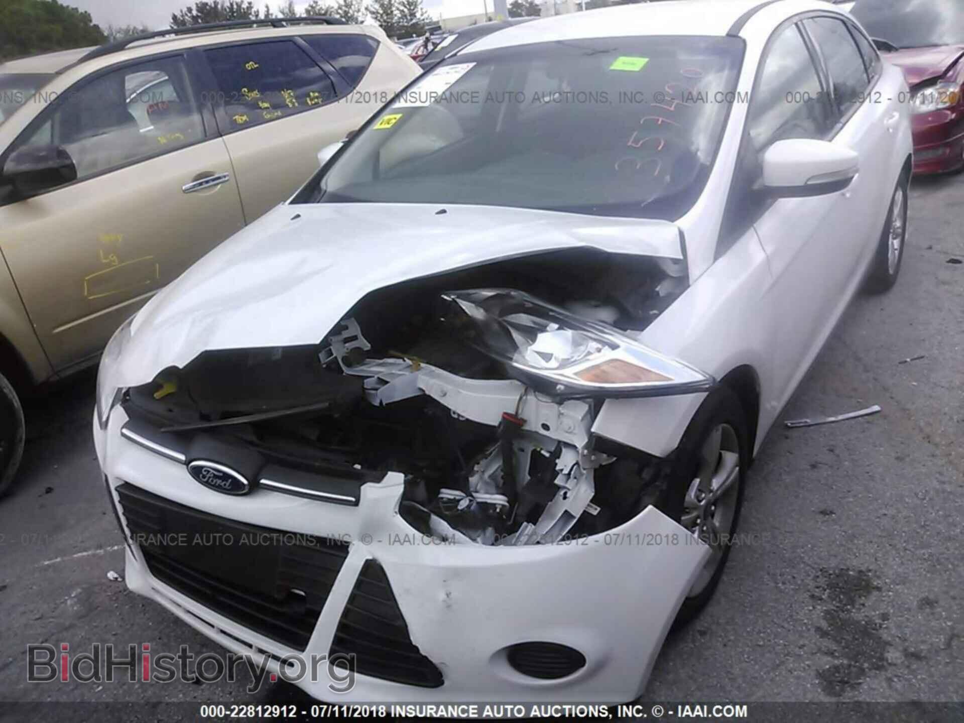 2014 Ford Focus - VIN: 1FADP3F23EL357420 - Photo 2