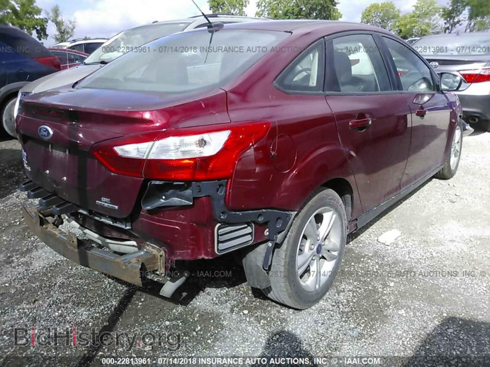 2013 Ford Focus - VIN: 1FADP3F24DL220128 - Фото 4