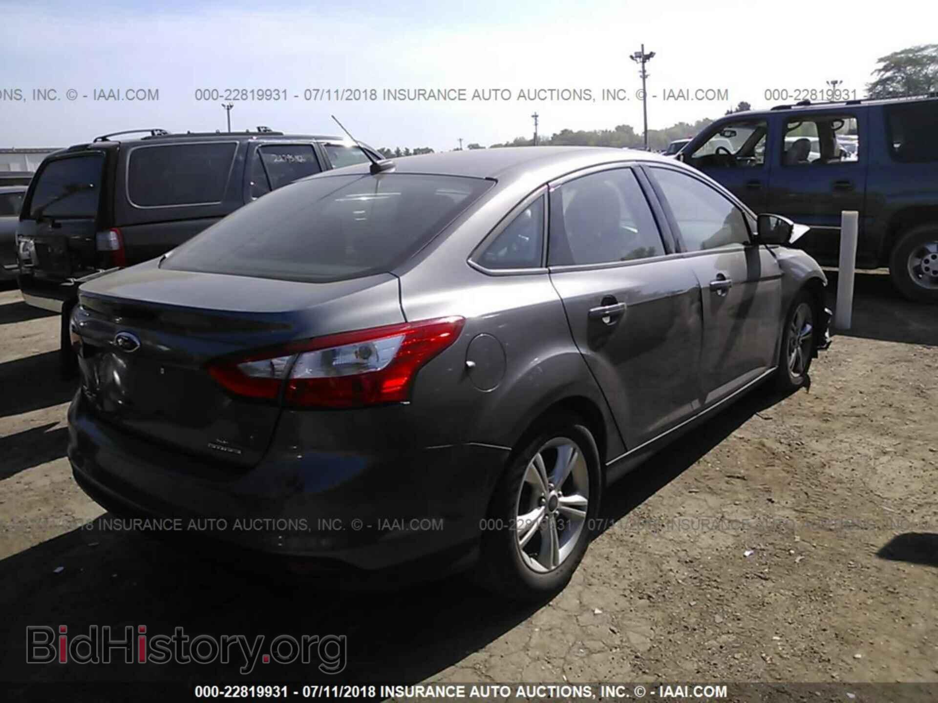 2014 Ford Focus - VIN: 1FADP3F21EL190622 - Фото 4