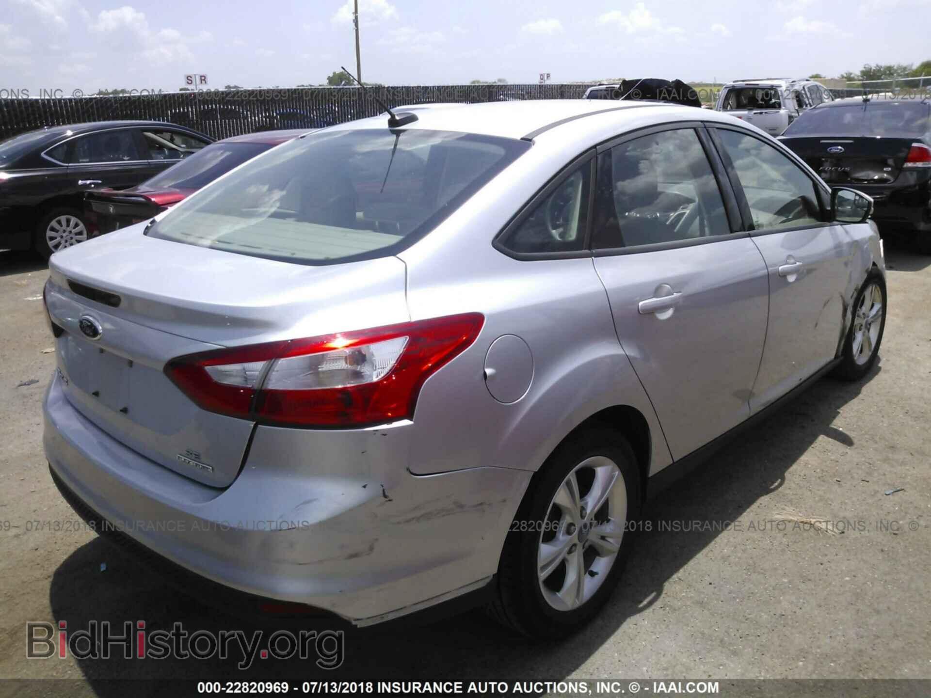 2013 Ford Focus - VIN: 1FADP3F21DL195317 - Photo 4