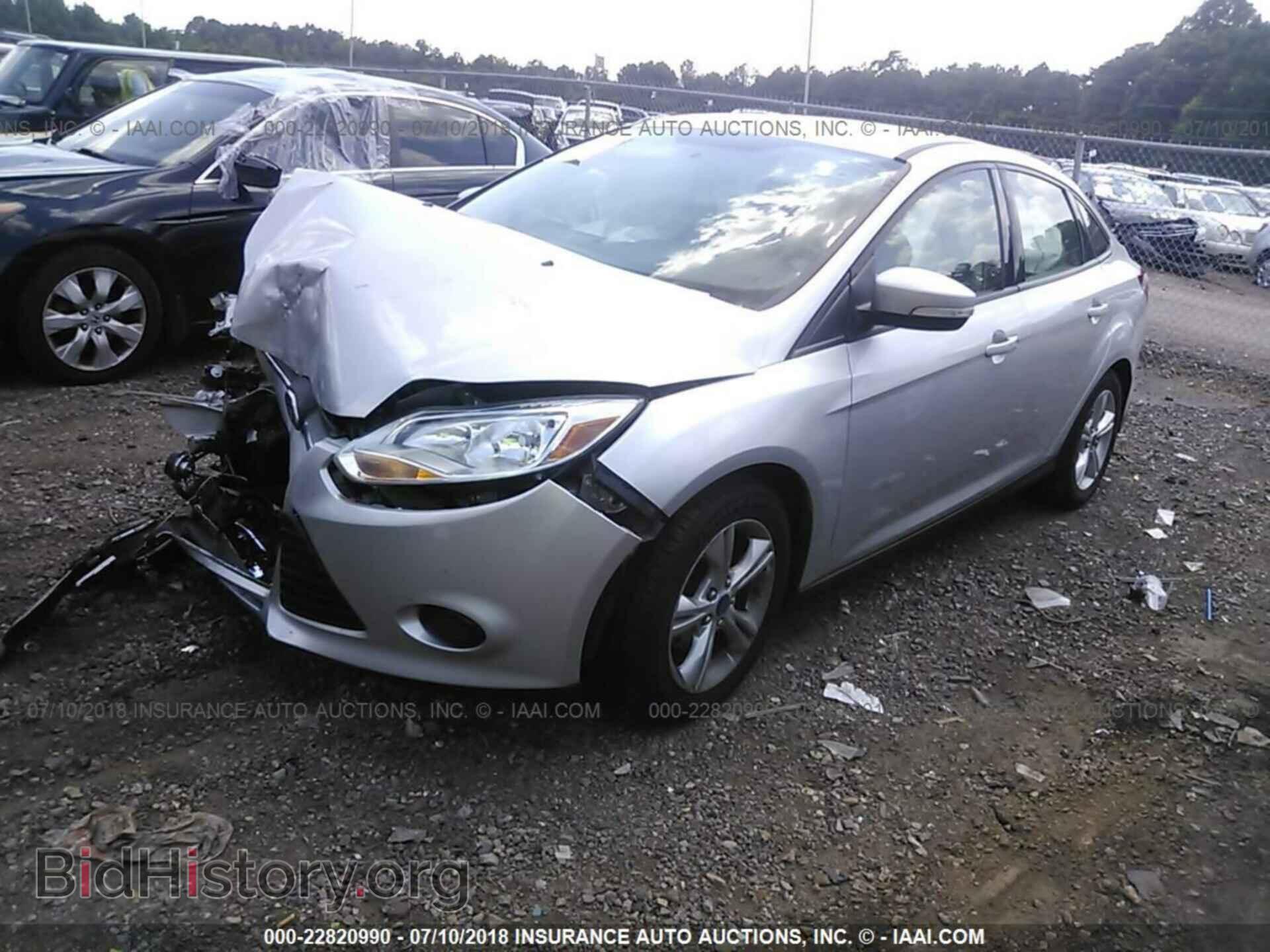 2014 Ford Focus - VIN: 1FADP3F21EL103804 - Photo 2