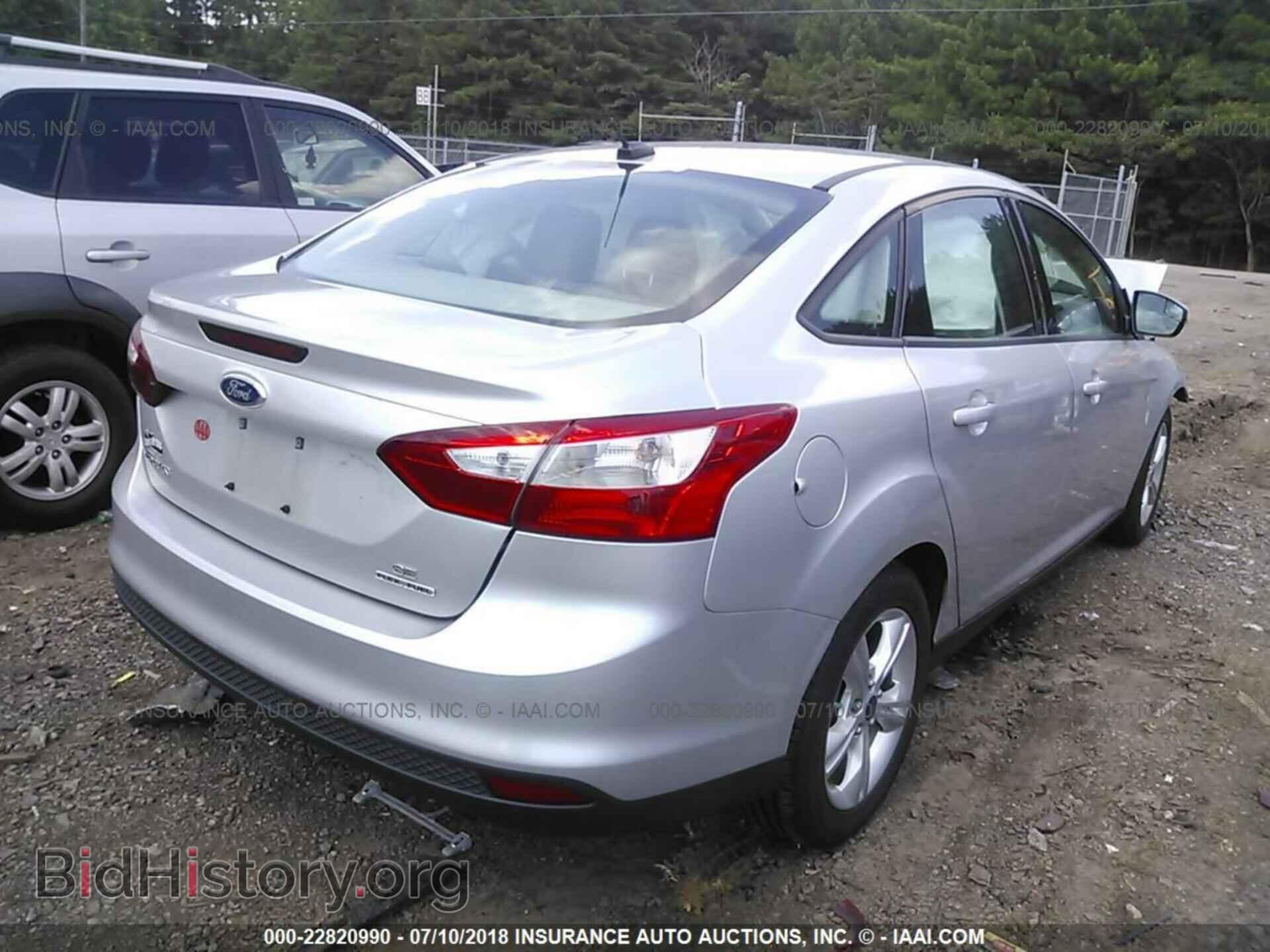 2014 Ford Focus - VIN: 1FADP3F21EL103804 - Photo 4