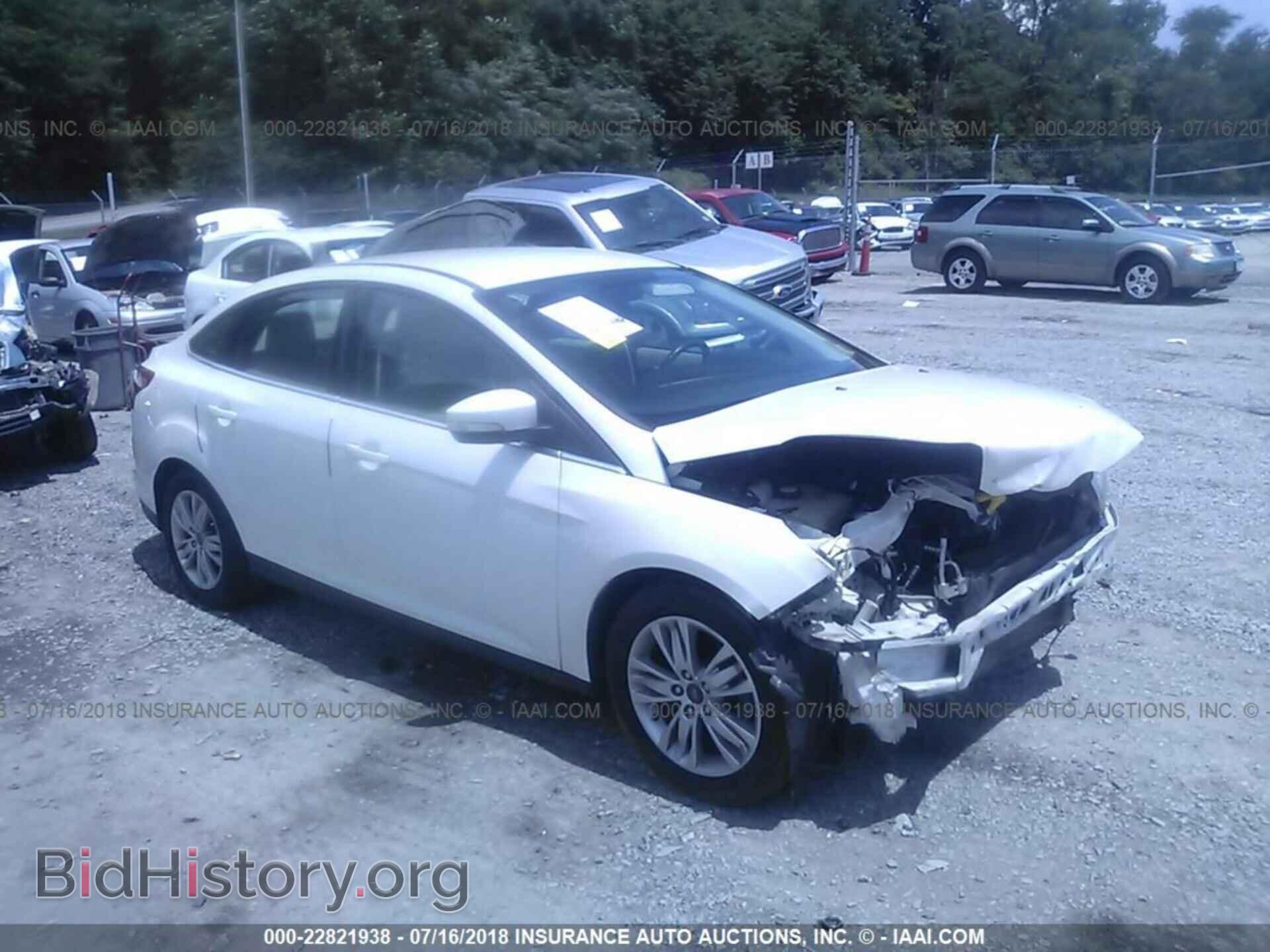 Photo 1FAHP3H26CL180244 - Ford Focus 2012