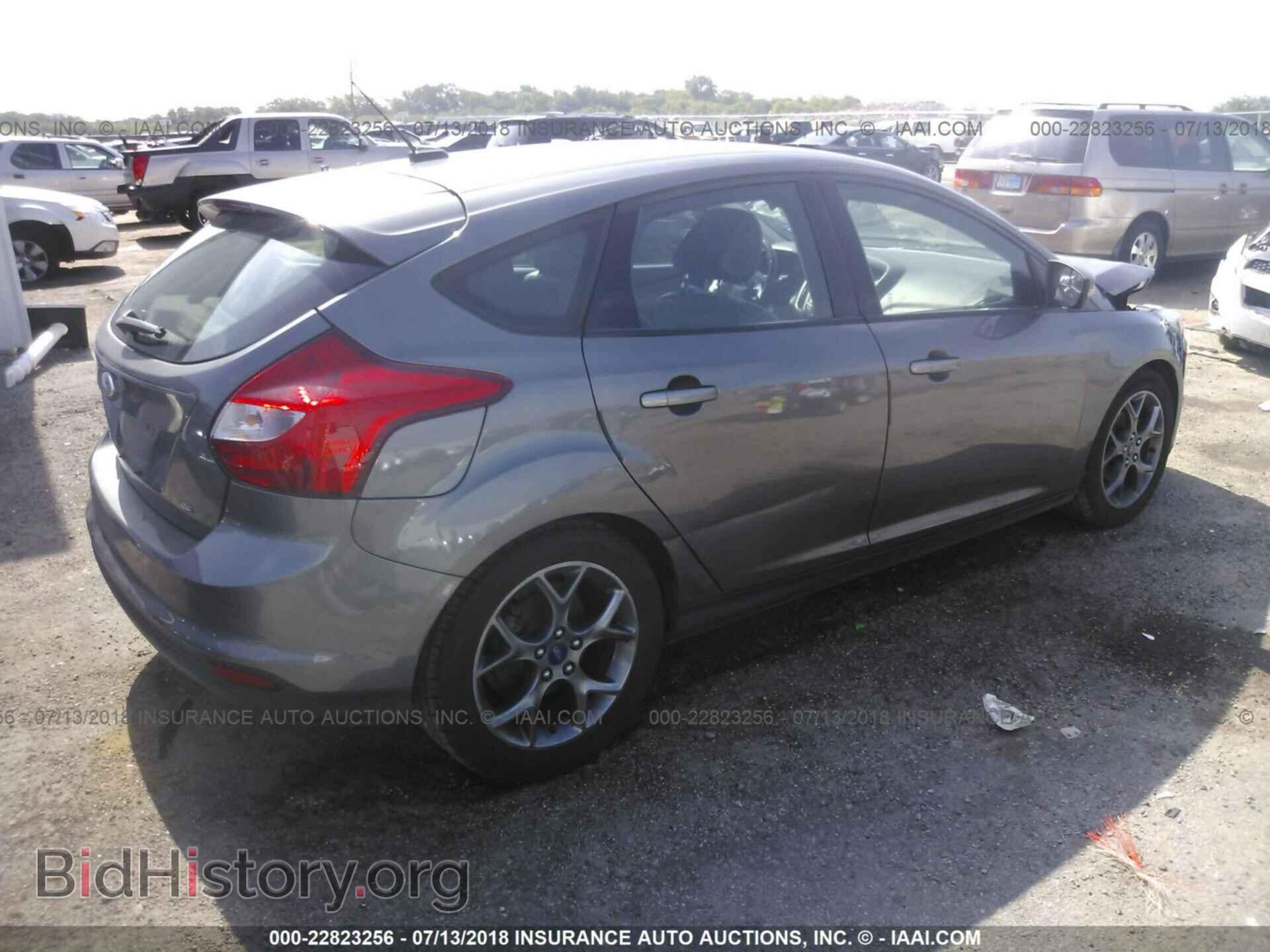 2013 Ford Focus - VIN: 1FADP3K20DL297875 - Photo 4