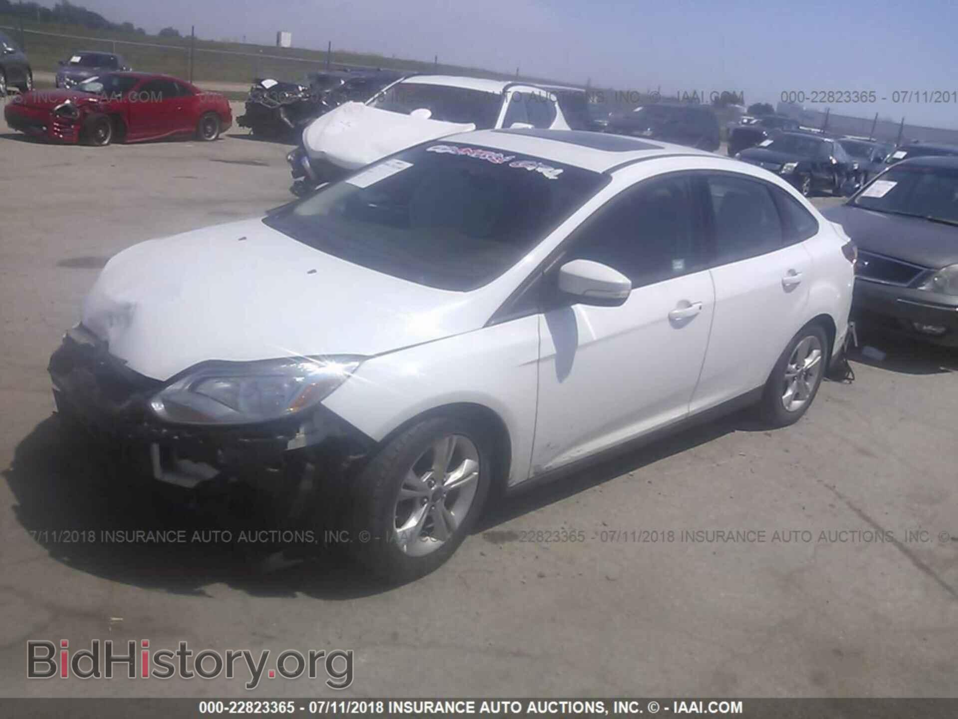 2014 Ford Focus - VIN: 1FADP3F24EL150678 - Photo 2
