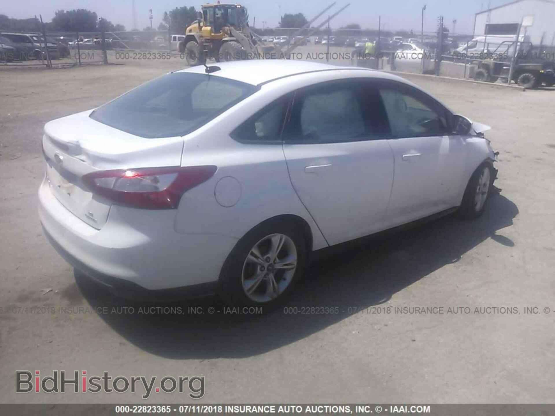 2014 Ford Focus - VIN: 1FADP3F24EL150678 - Photo 4
