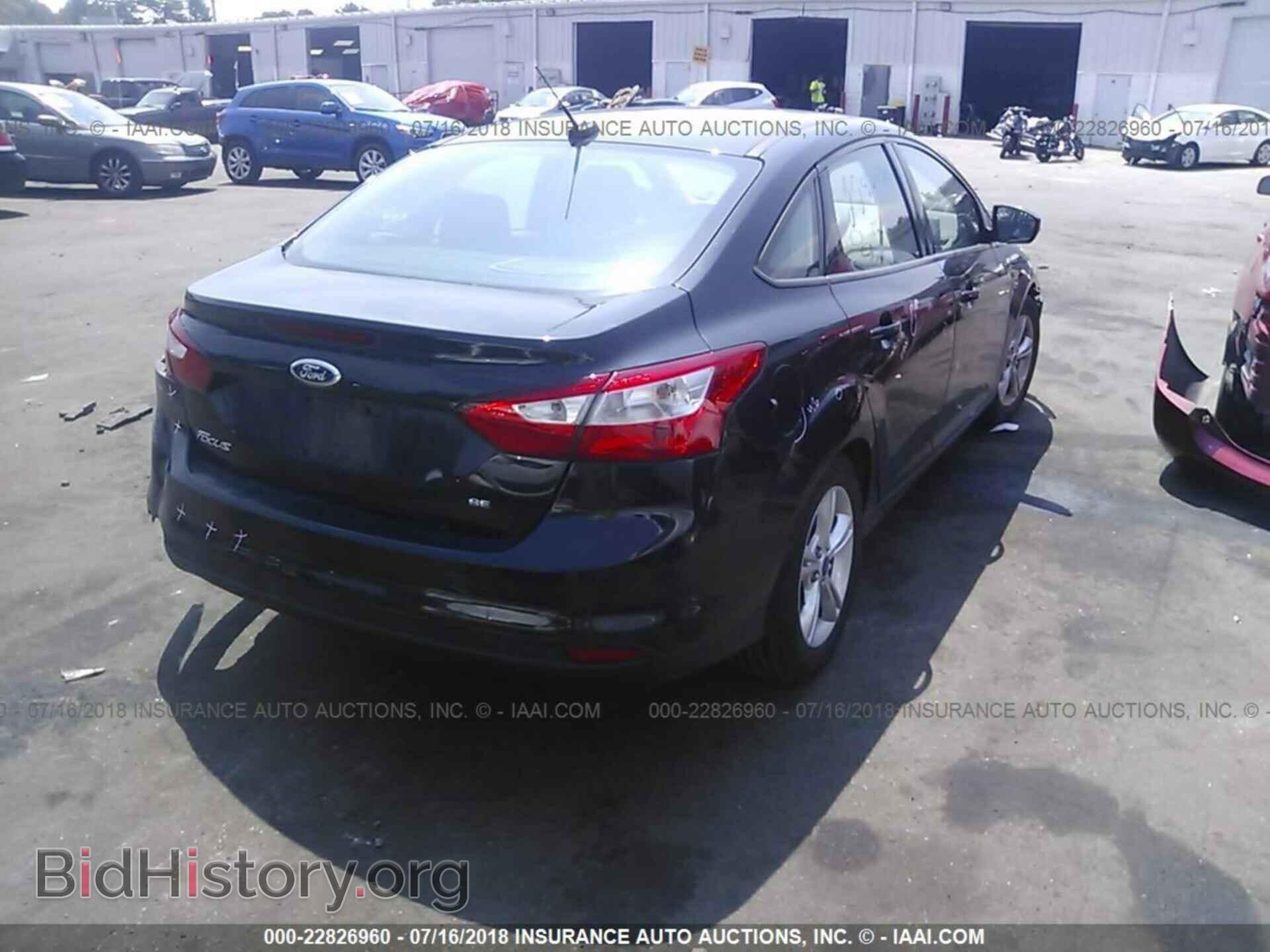 2014 Ford Focus - VIN: 1FADP3F24EL171983 - Фото 4
