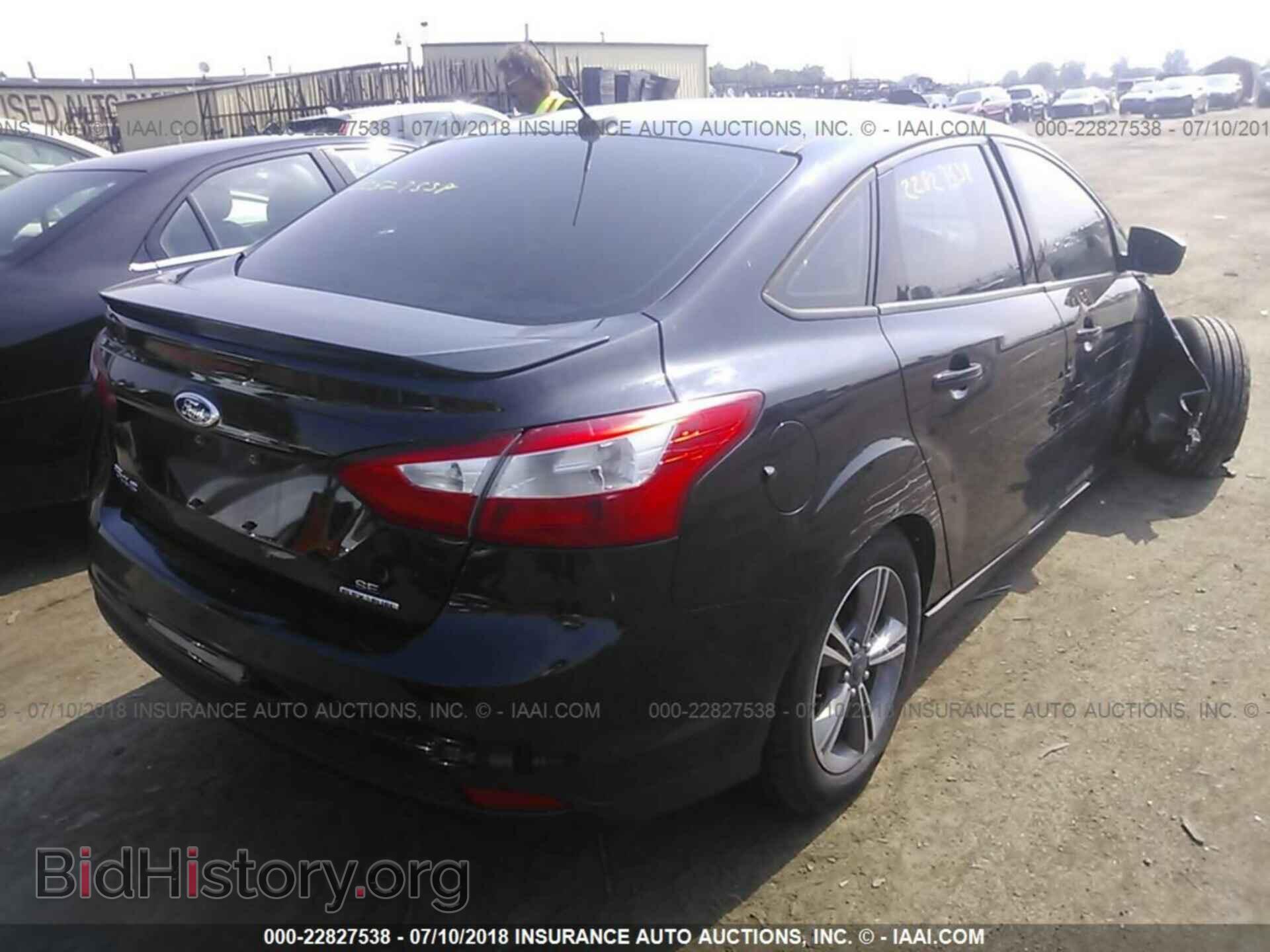 2014 Ford Focus - VIN: 1FADP3F22EL246230 - Photo 4